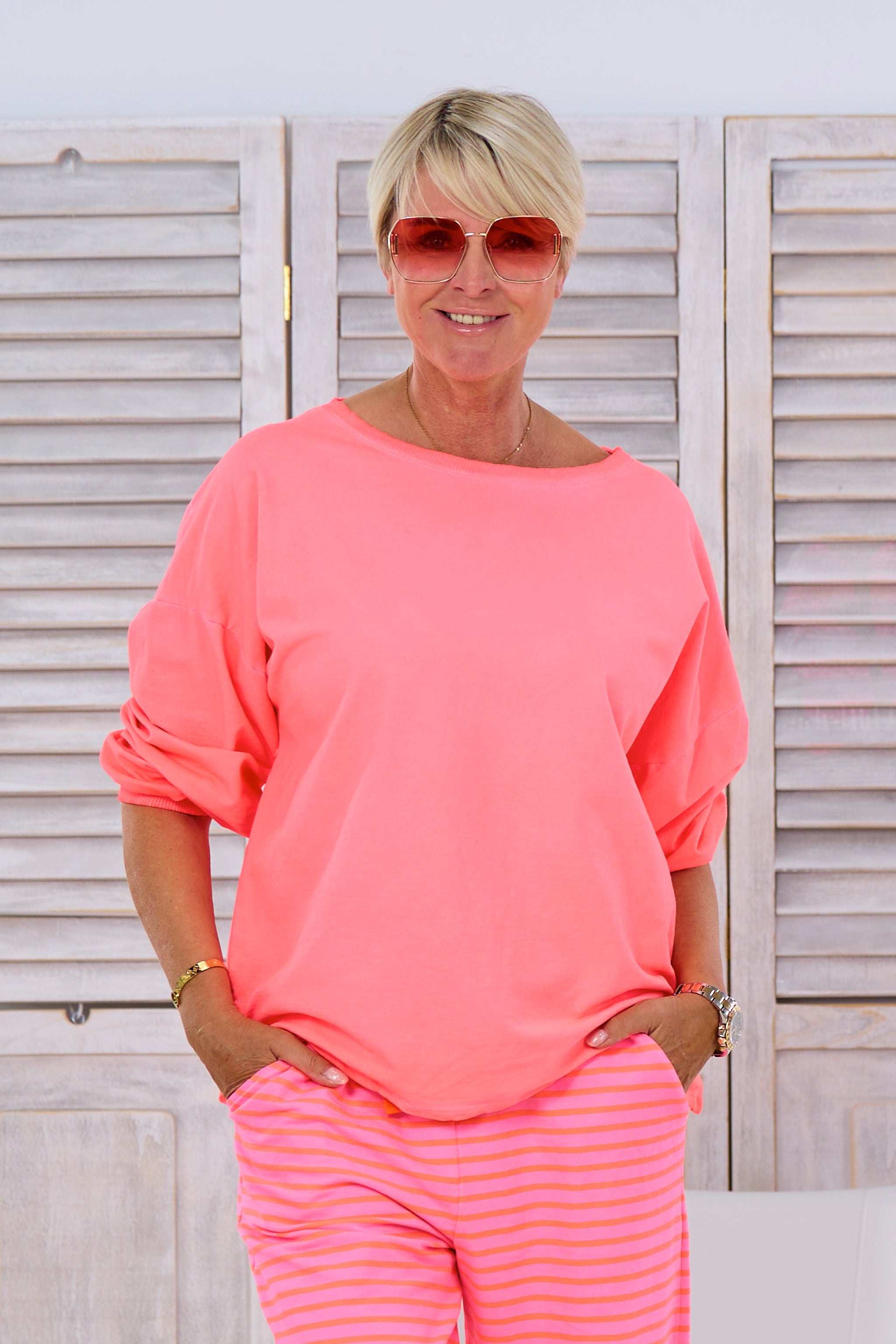 Langarmshirt mit coolem Rücken-Ausschnitt, neon apricot von Trends & Lifestyle Deutschland GmbH