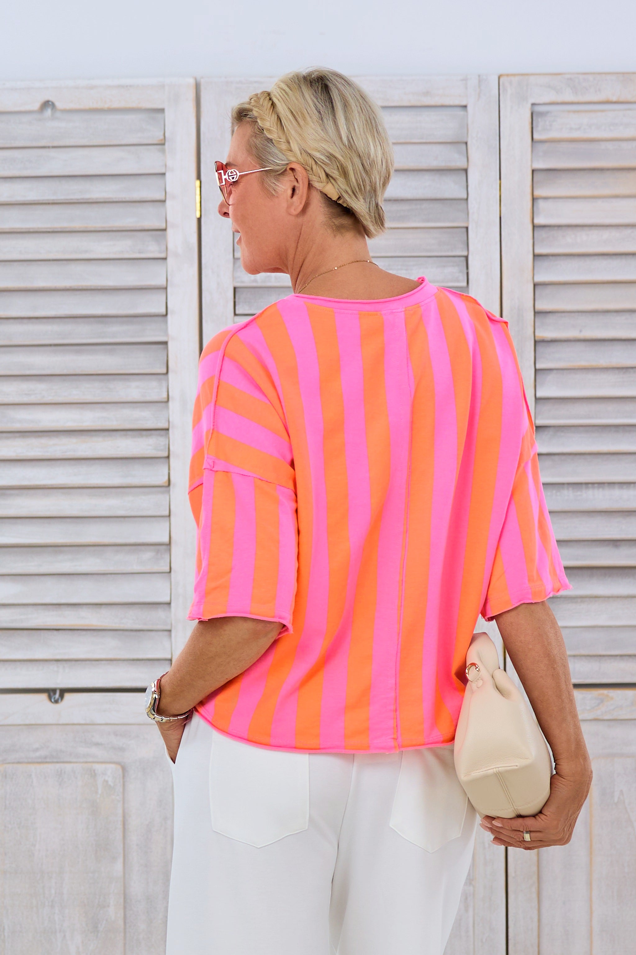 Striped sweatshirt with chest pocket, pink-orange