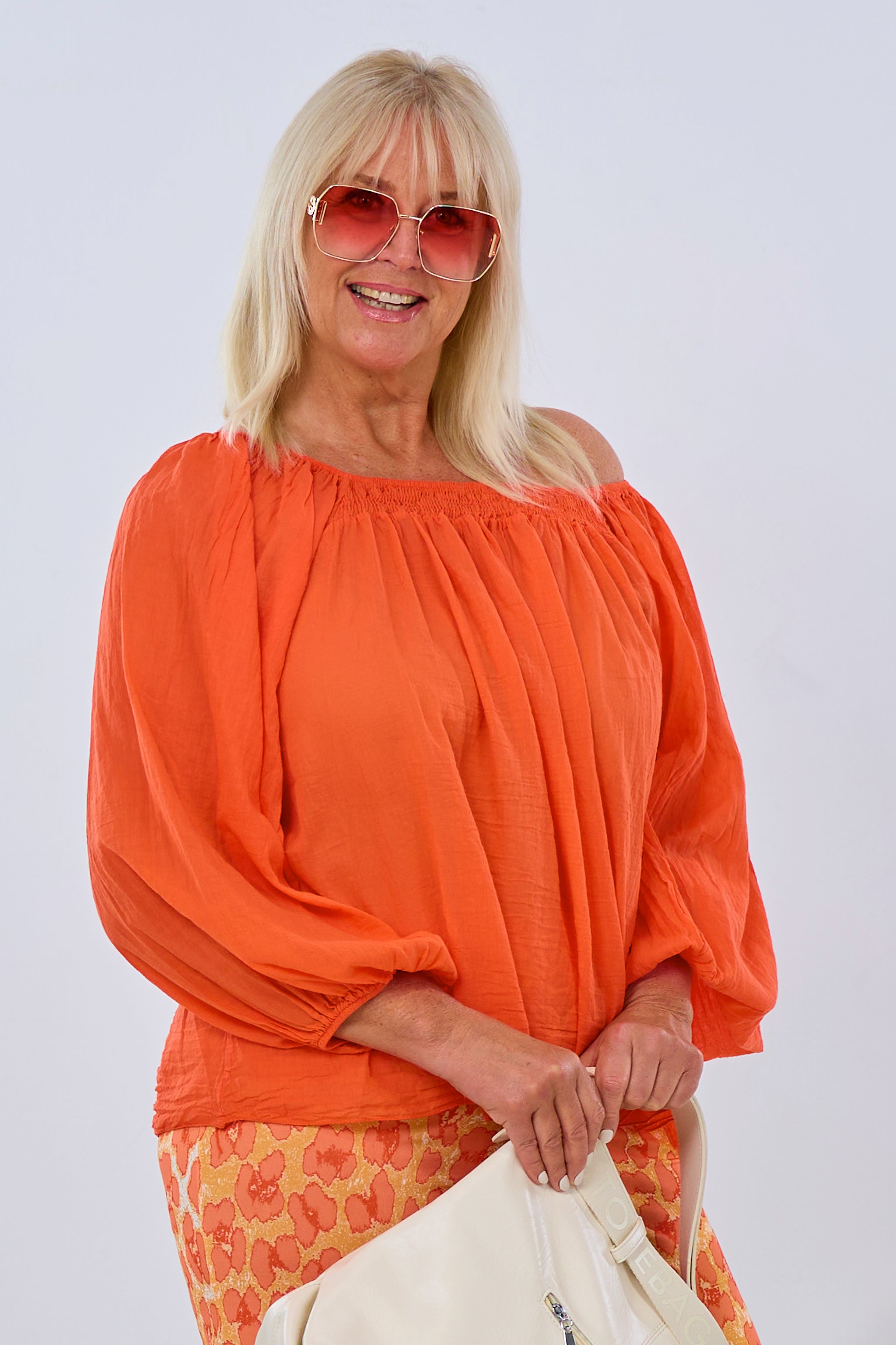 airy blouse with off-the-shoulder neckline, orange