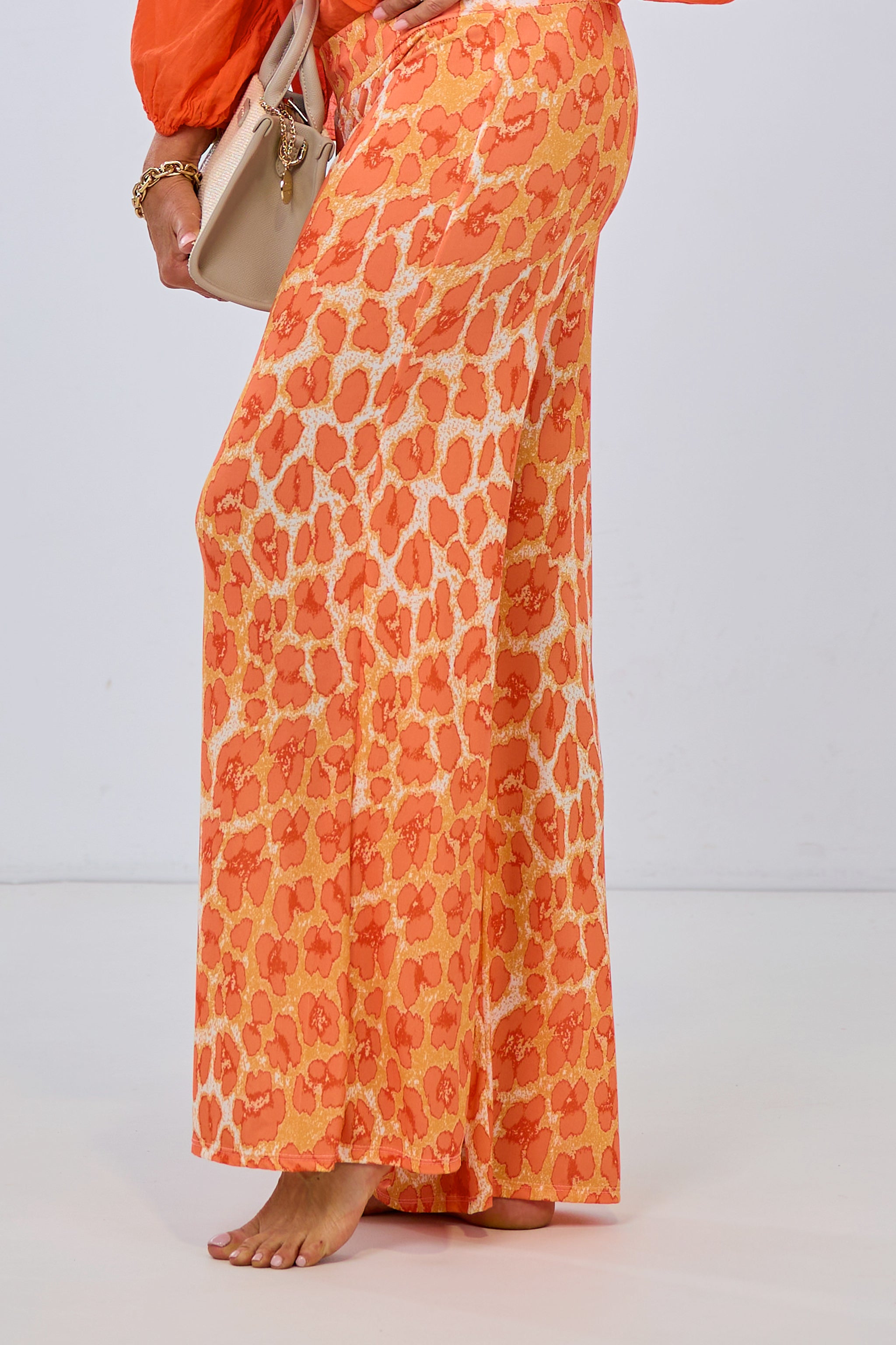 soft falling pants with leopard pattern, orange-ecru