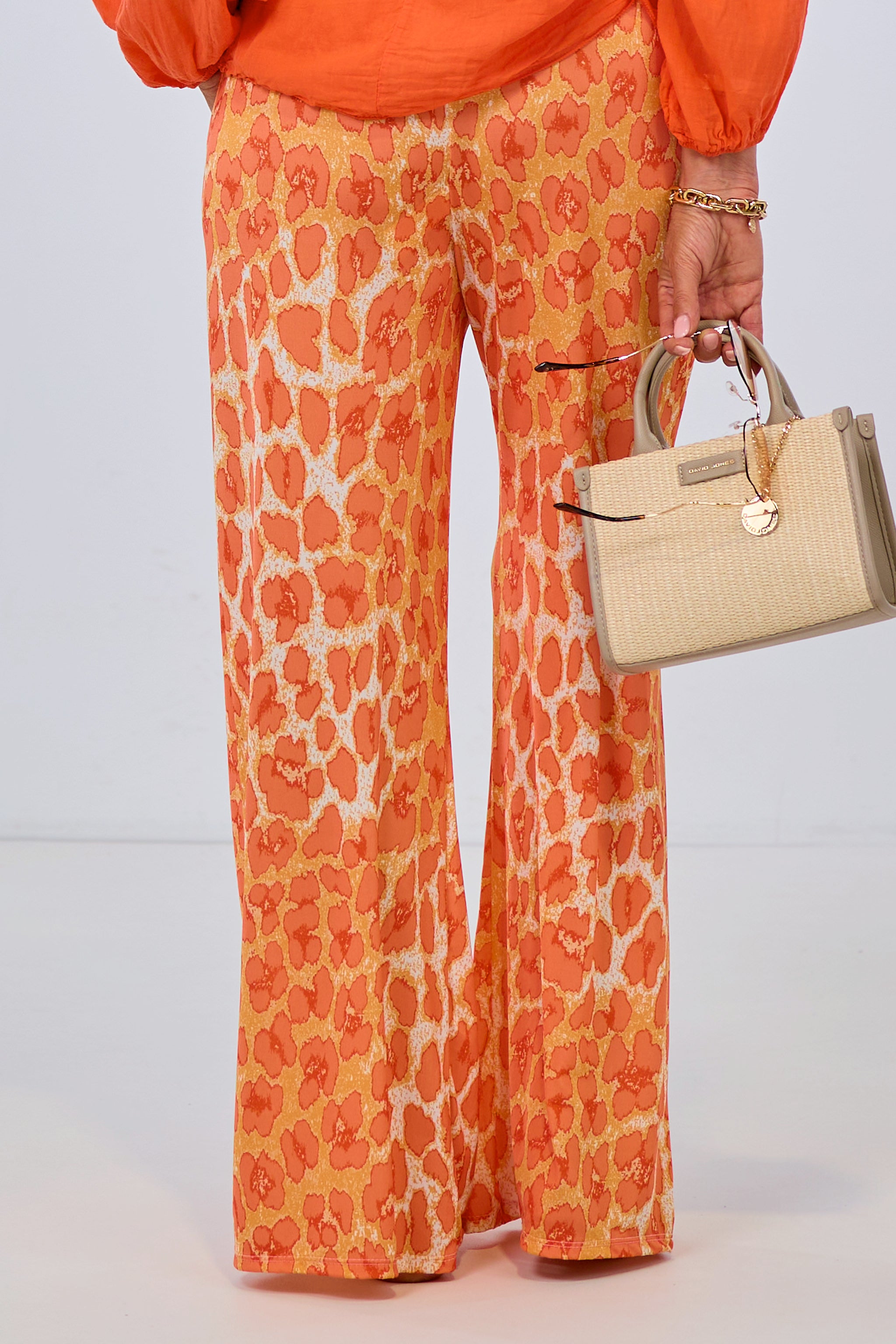 soft falling pants with leopard pattern, orange-ecru