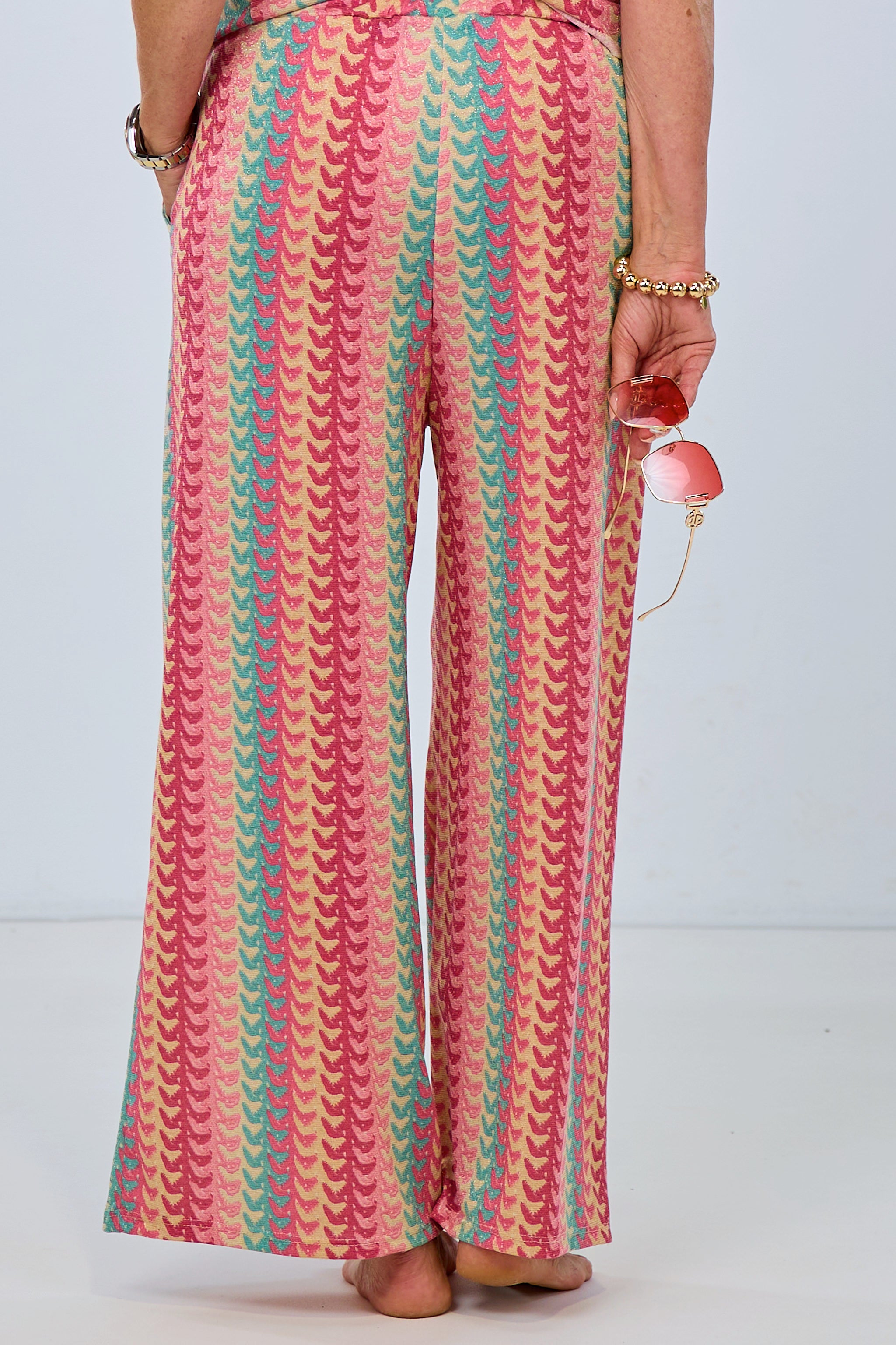 Hose mit Retromuster in rosa-bunt-gold, gerade geschnitten mit elastischem Bund