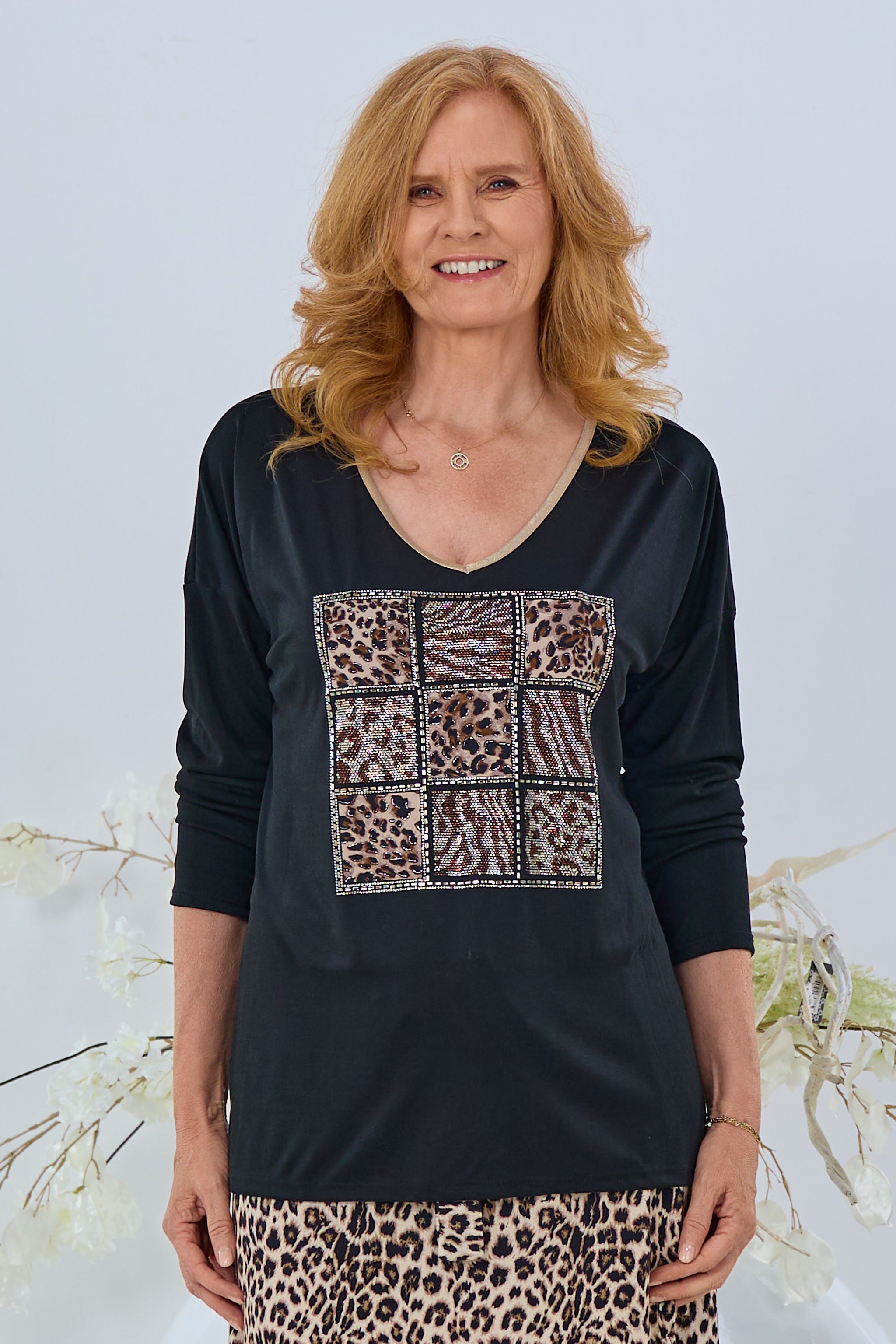Langarm Shirt mit Glitzermotiv, schwarz-gold