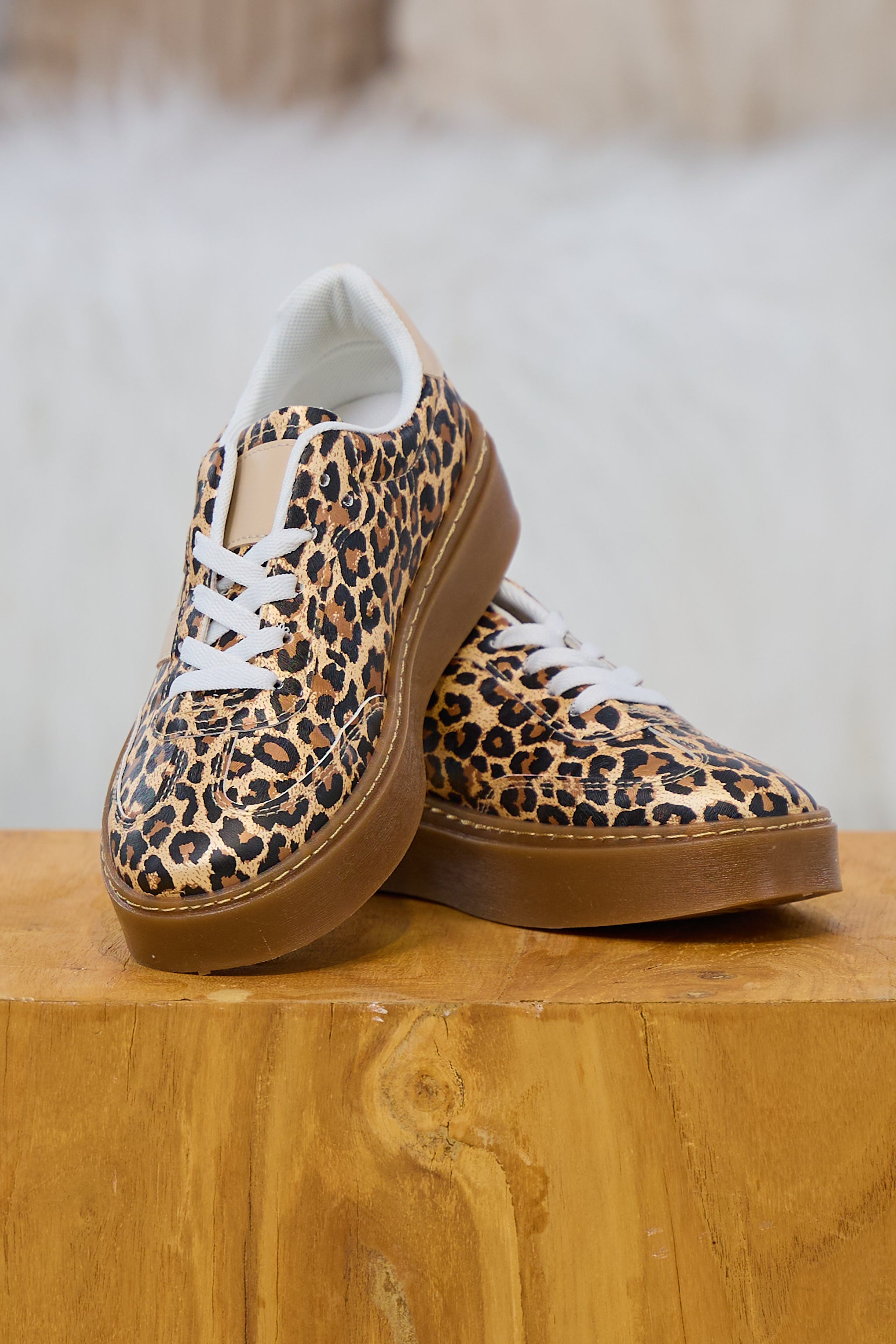 Sneaker im Leo Look mit Plateausohle, leo-metallic