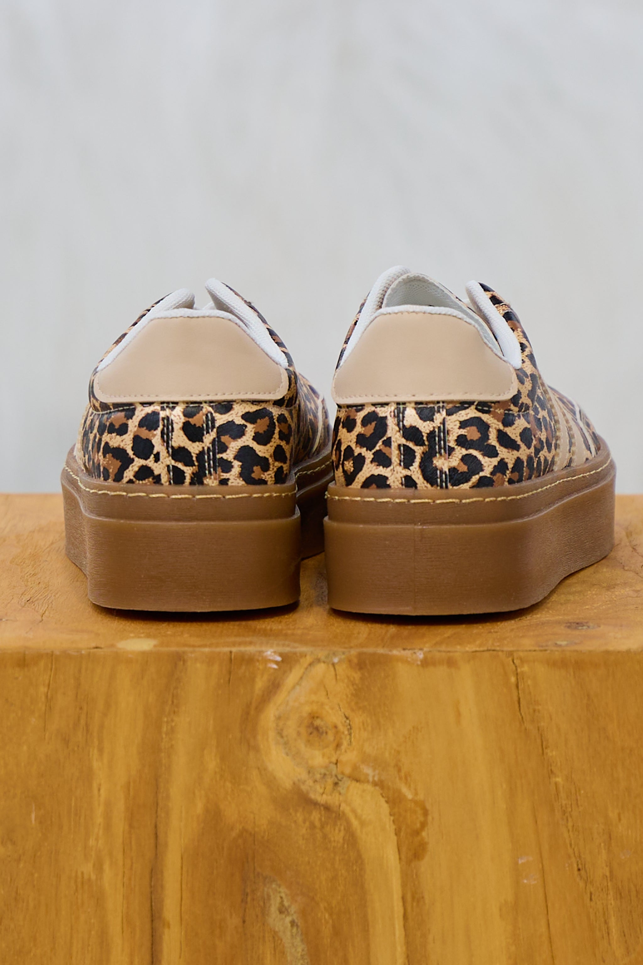 Sneaker im Leo Look mit Plateausohle, leo-metallic