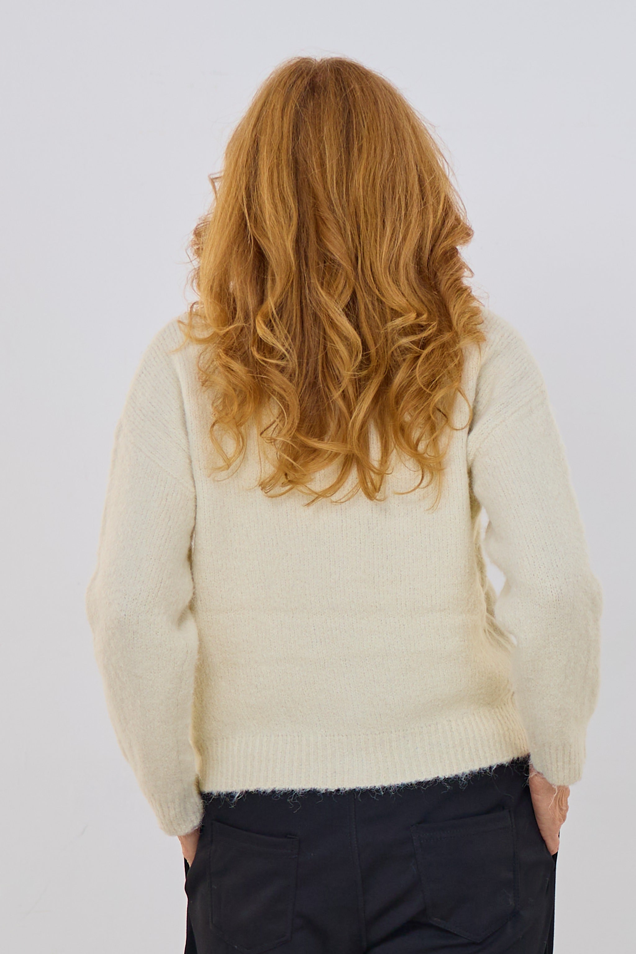 Strickpulli mit V-Ausschnitt und Schleifen, creme-schwarz