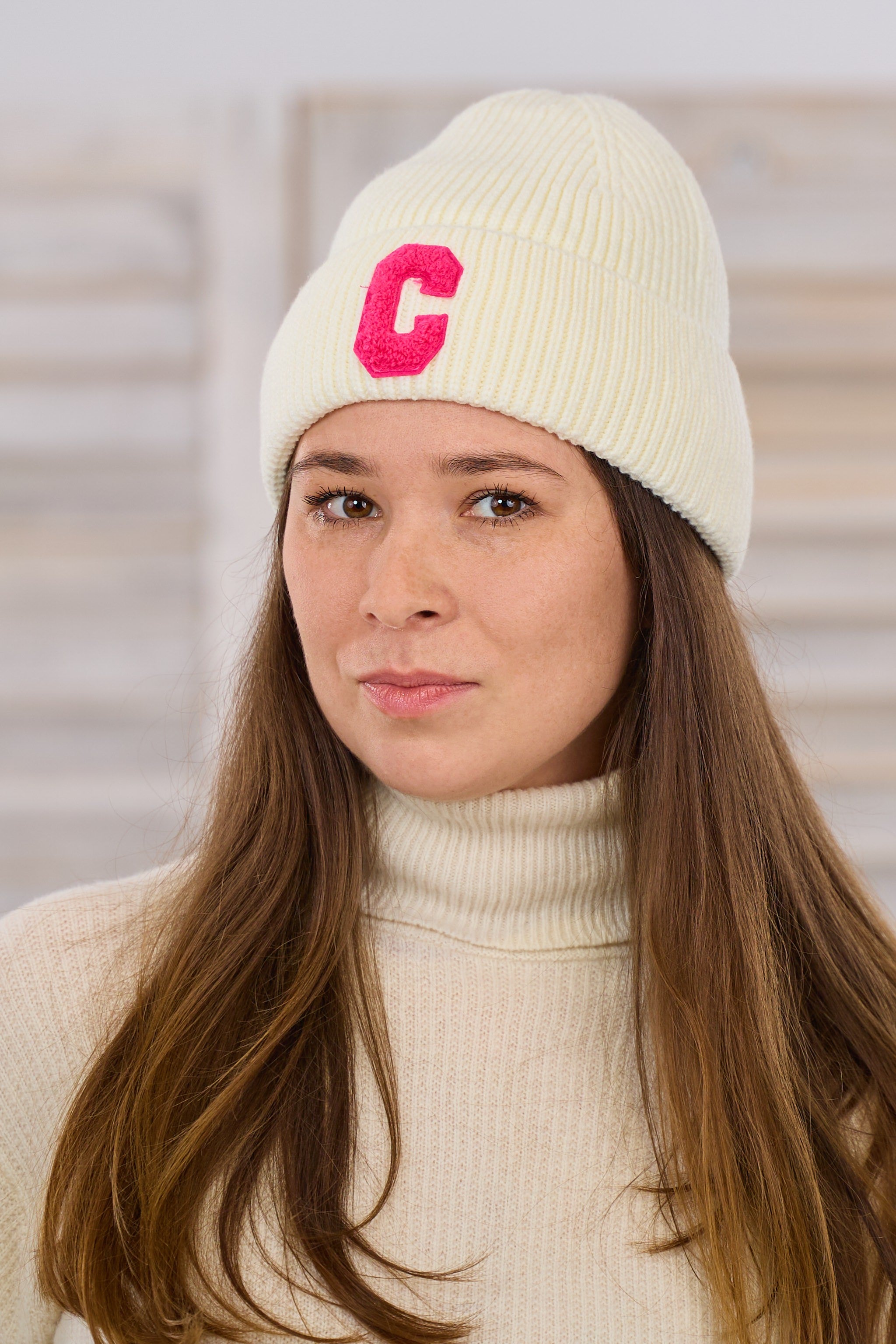 gefütterte Mütze "C"-Flock, creme-pink