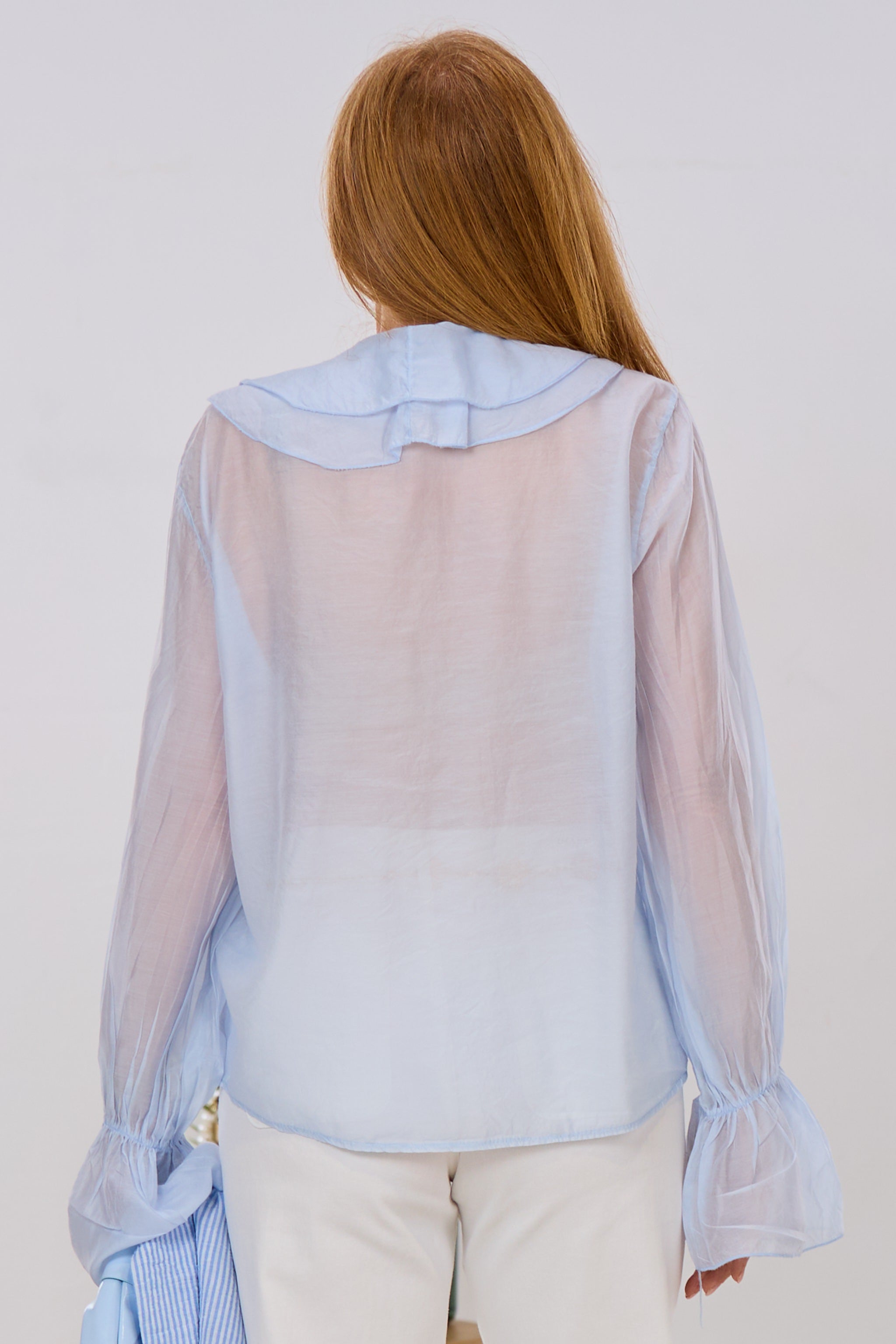 Transparente Bluse mit Volants, hellblau