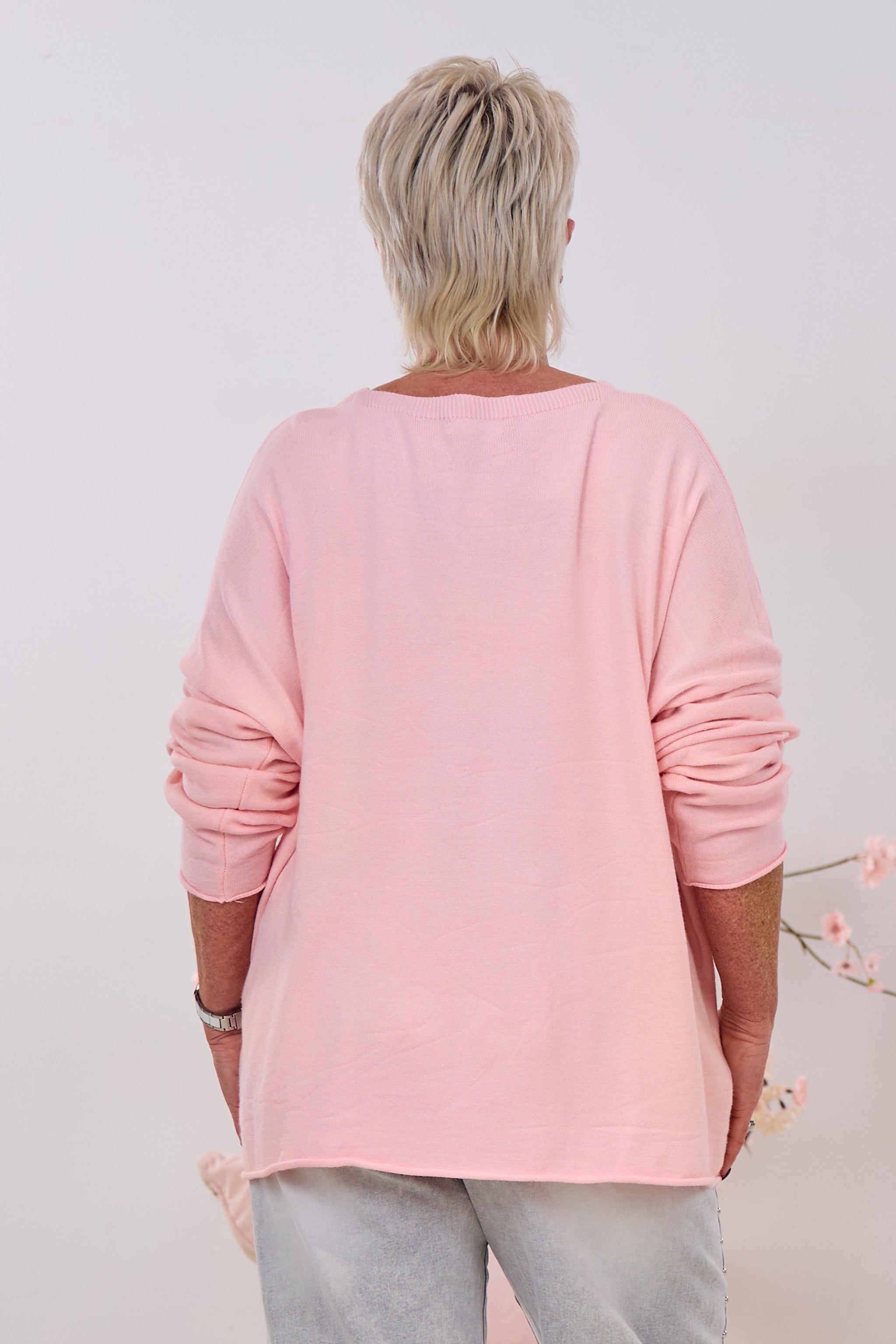 Oversized Strickpulli mit fransigen Buchstaben, rosa