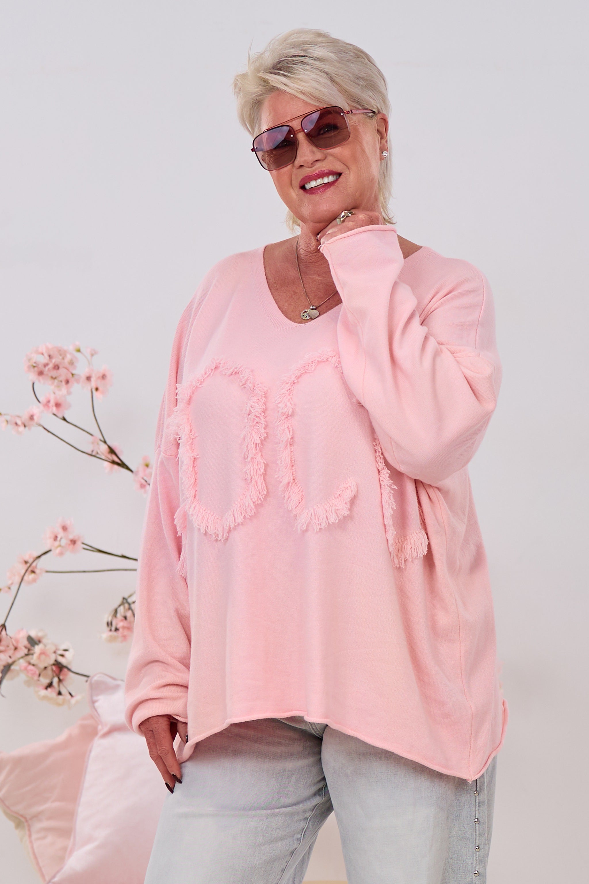 Oversized Strickpulli mit fransigen Buchstaben, rosa