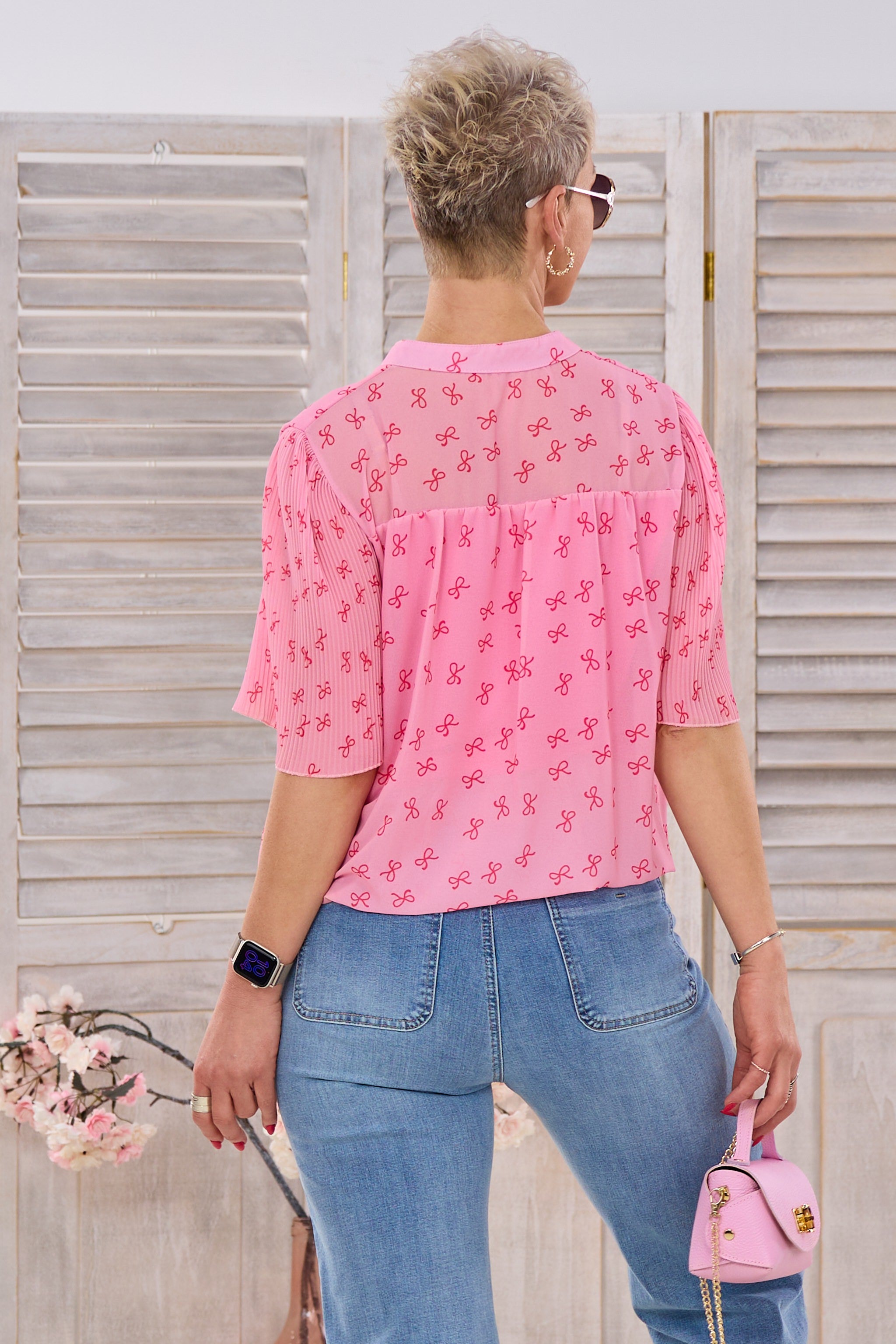 Bluse mit Schleifen und Plissee-Ärmeln, rosa-rot