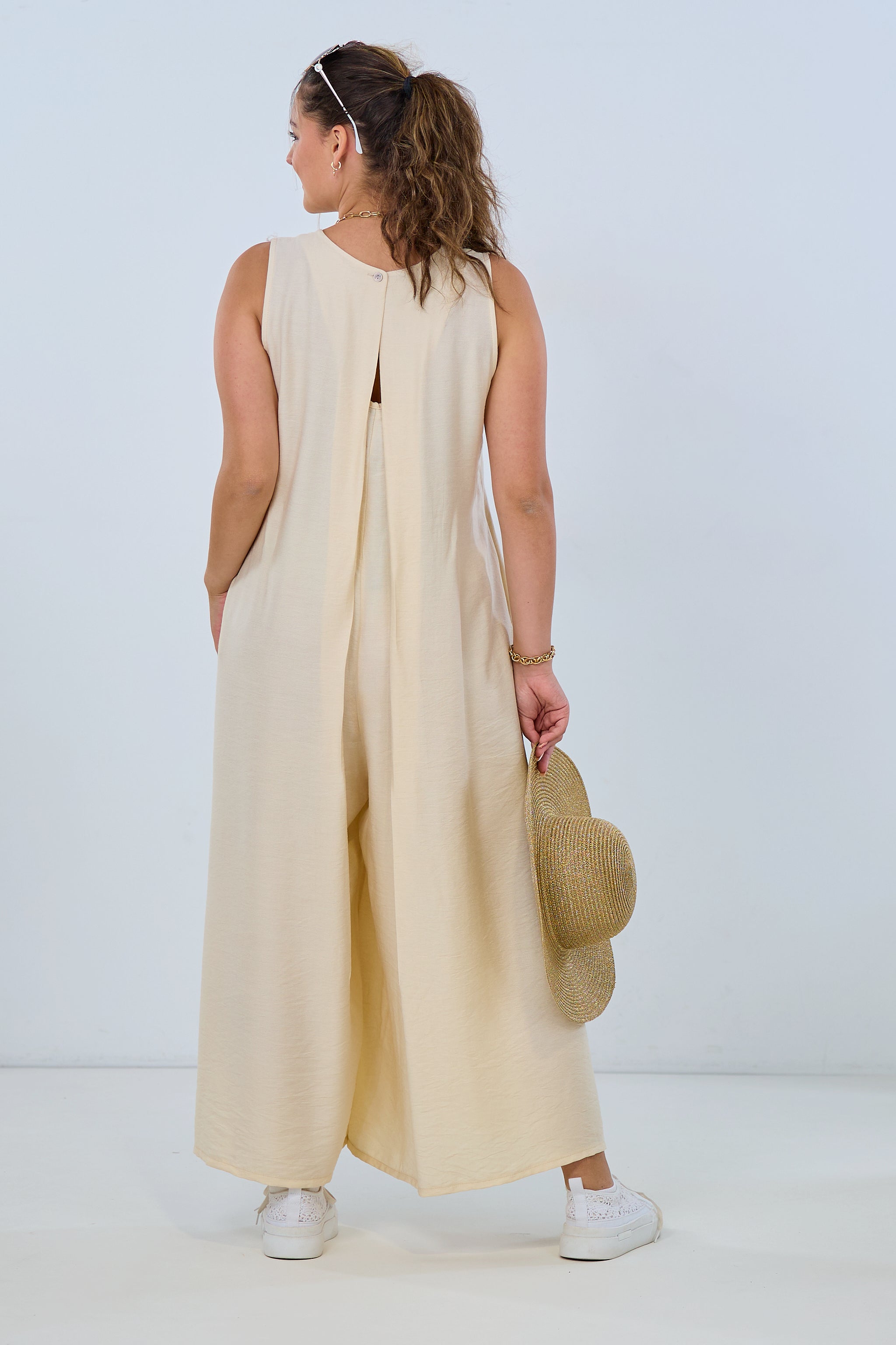 Overall with a sophisticated back slit, cream
