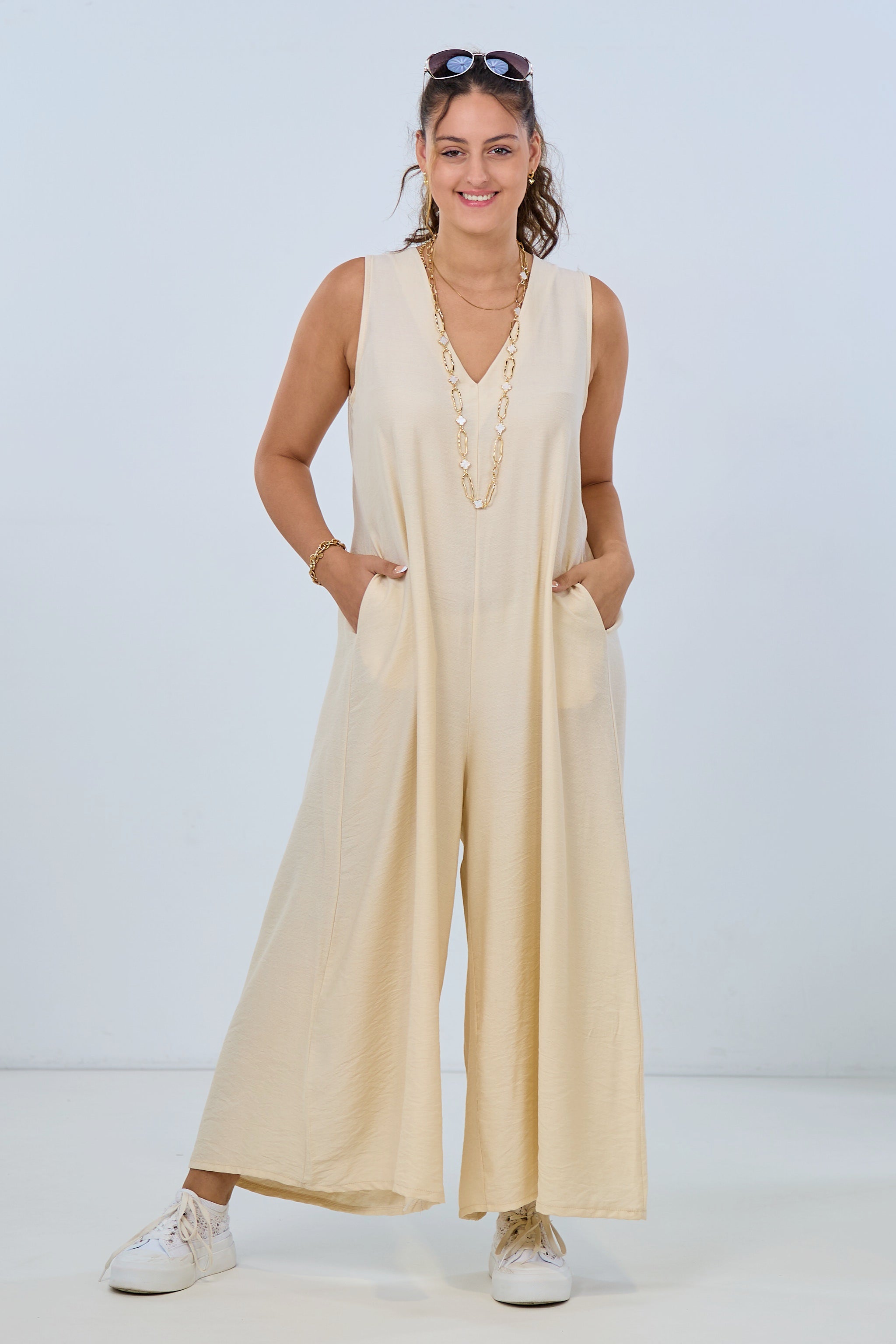 Overall with a sophisticated back slit, cream