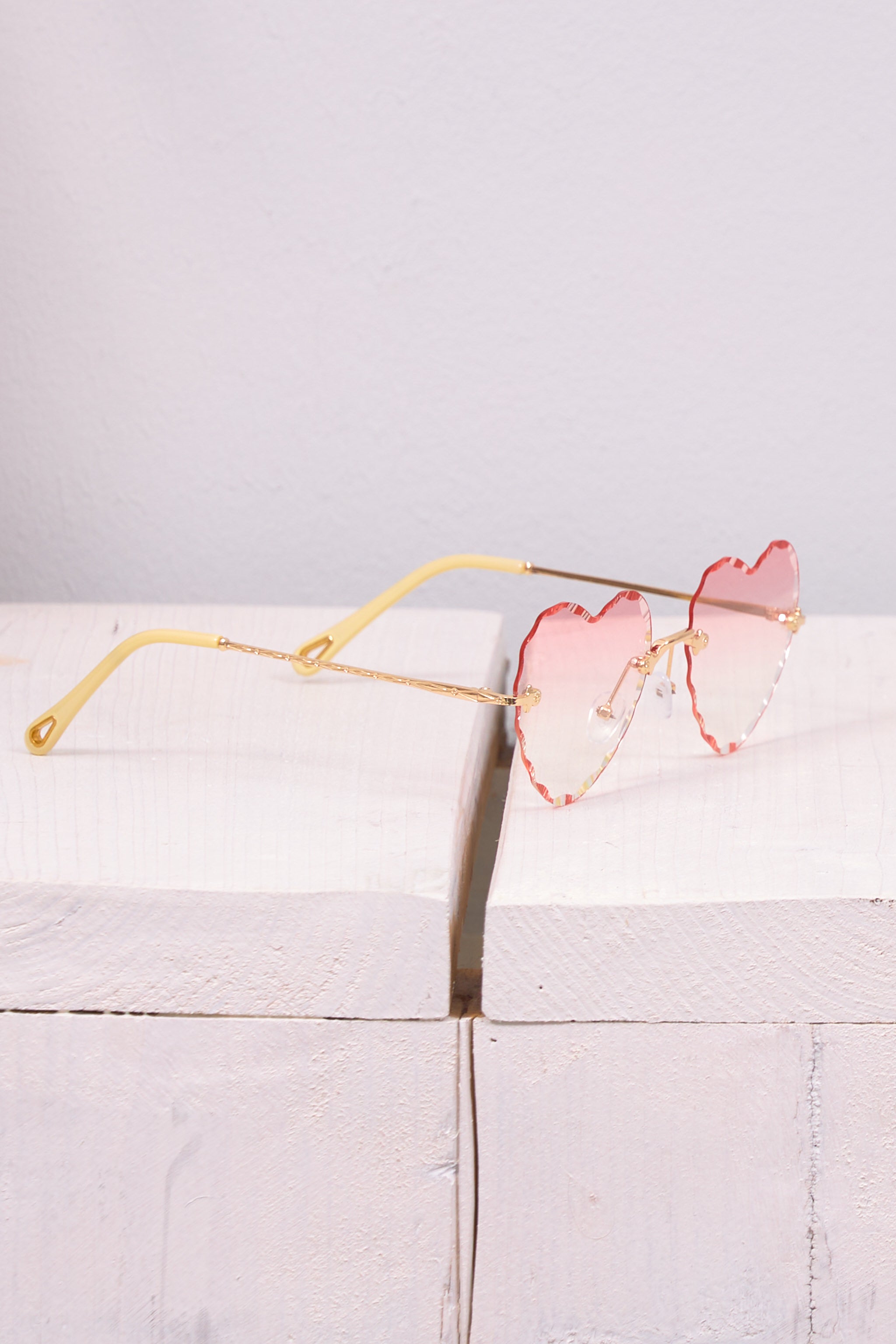 Sonnenbrille in Herzform, rosa