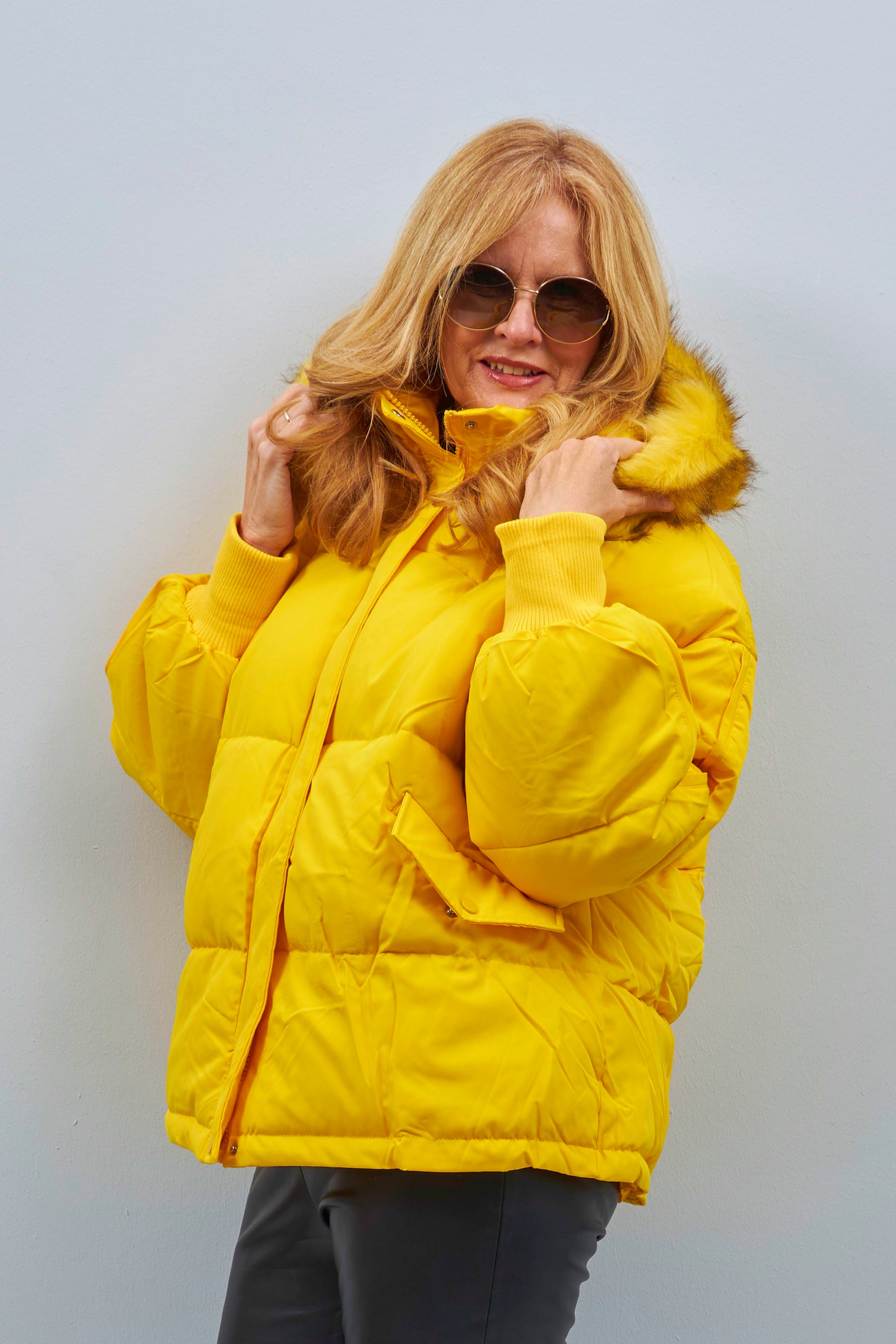 Quilted jacket with fur hood, yellow