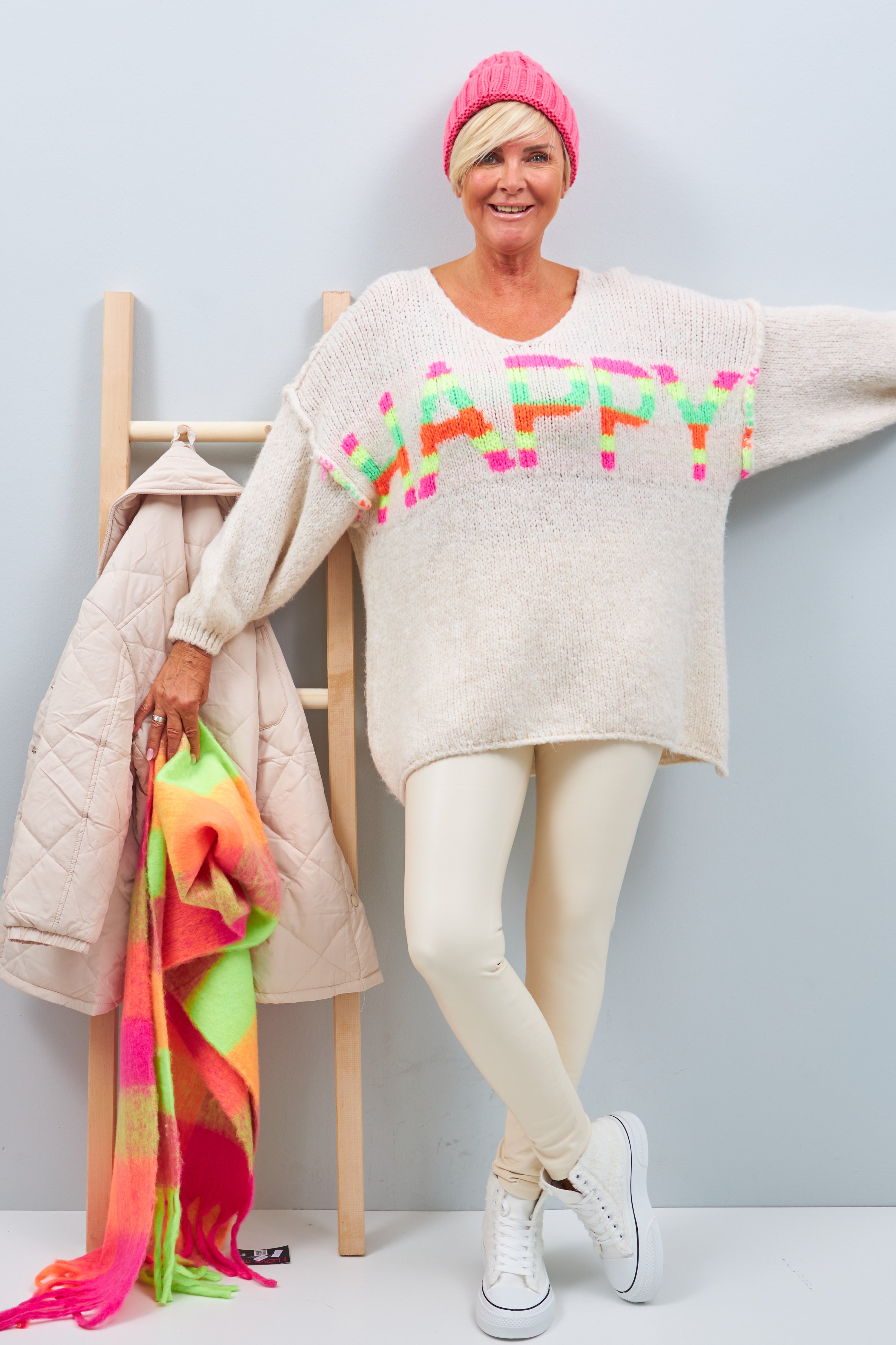Knitted sweater with "HAPPY" lettering, beige-colored