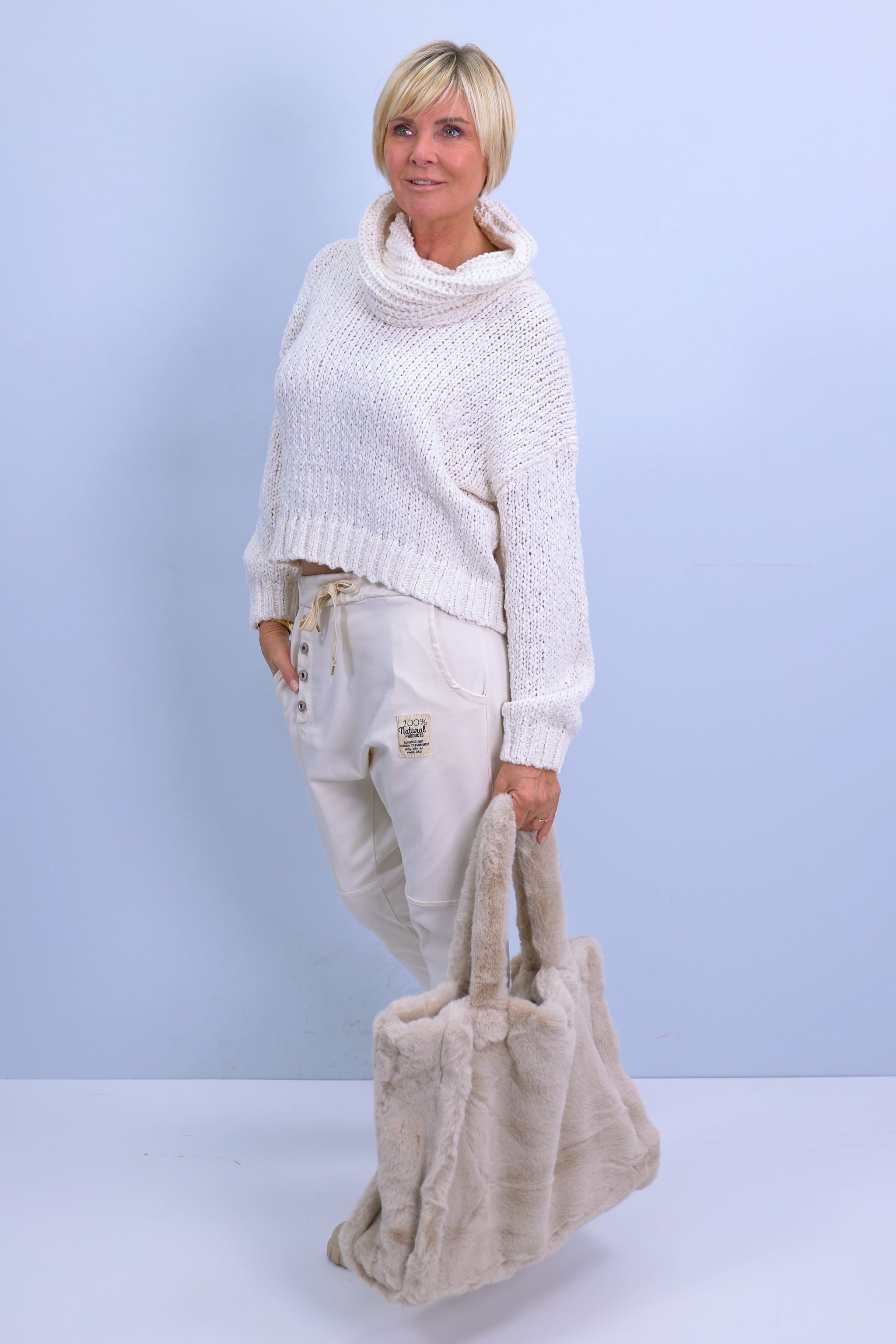 Knitted sweater with a turtleneck, ecru