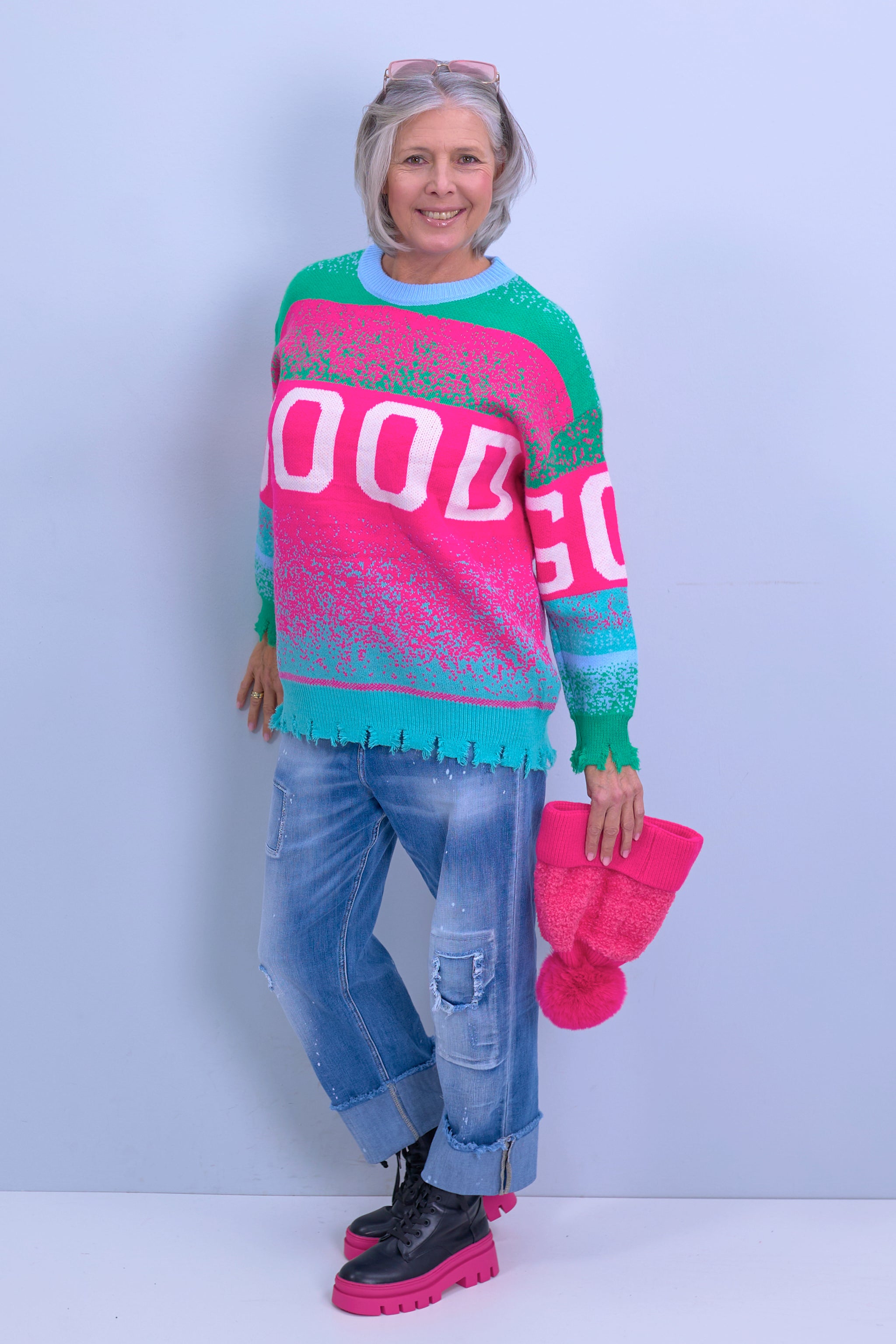 Knitted sweater destroyed, pink-colorful