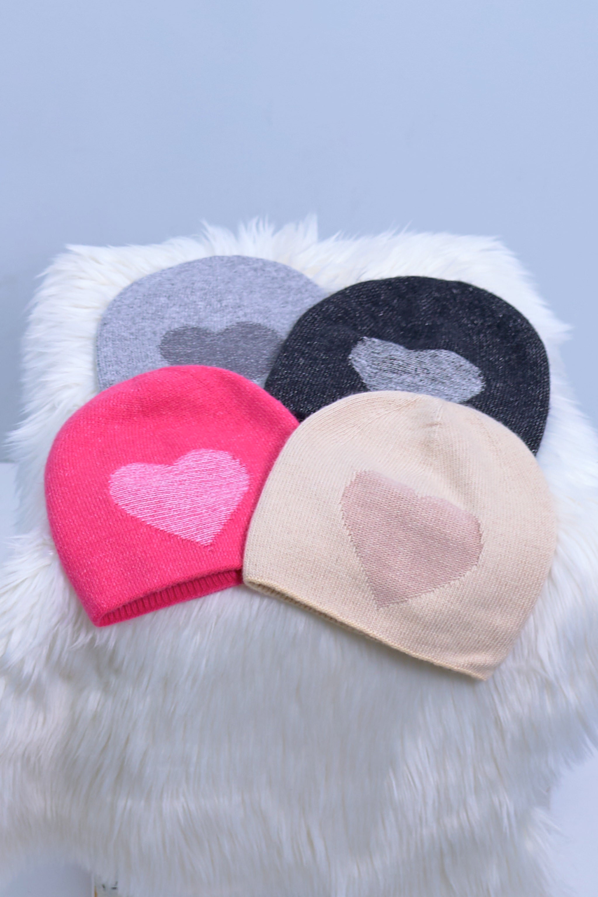 Hat with knitted heart, four colors