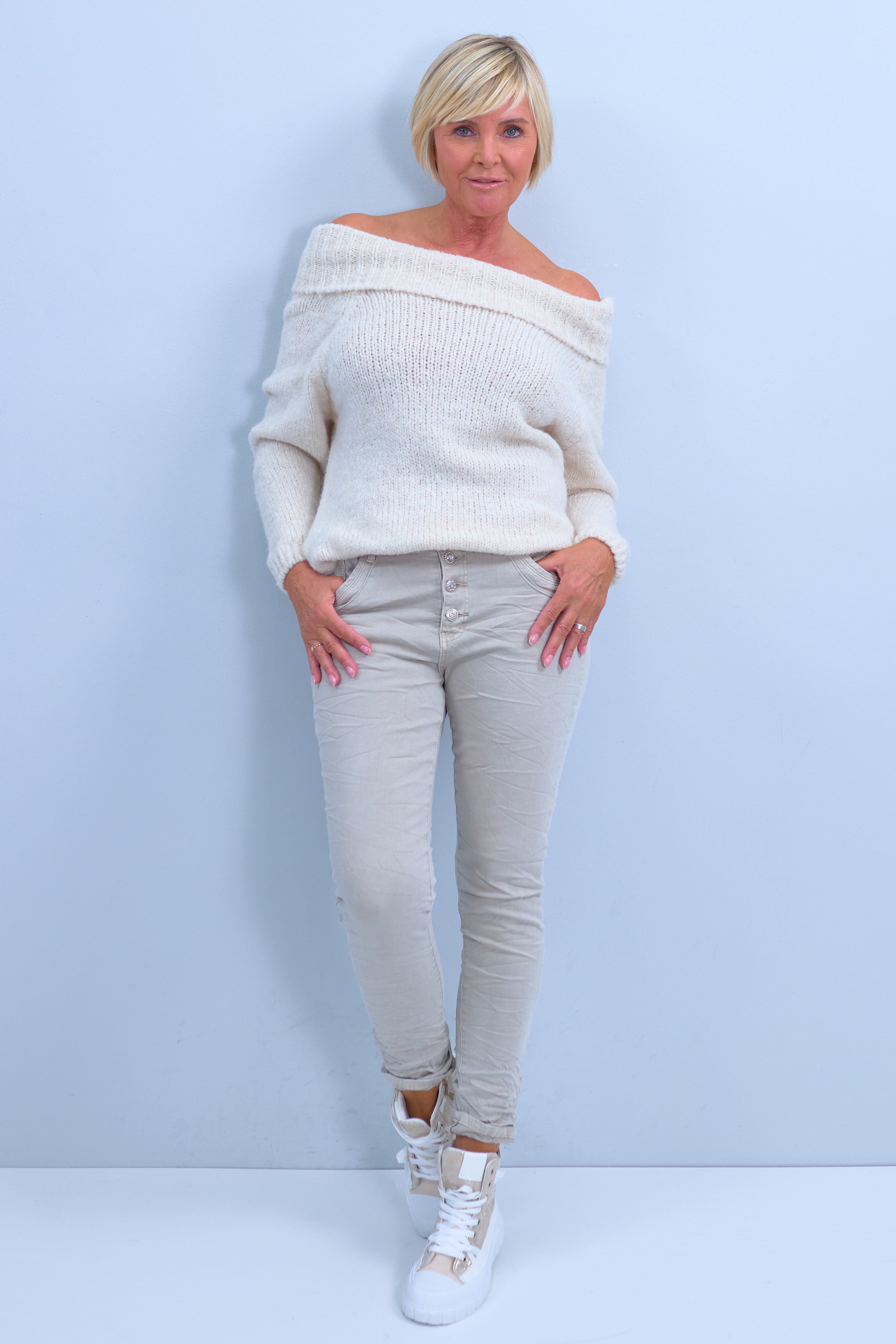Knitted sweater with wide turtleneck, cream
