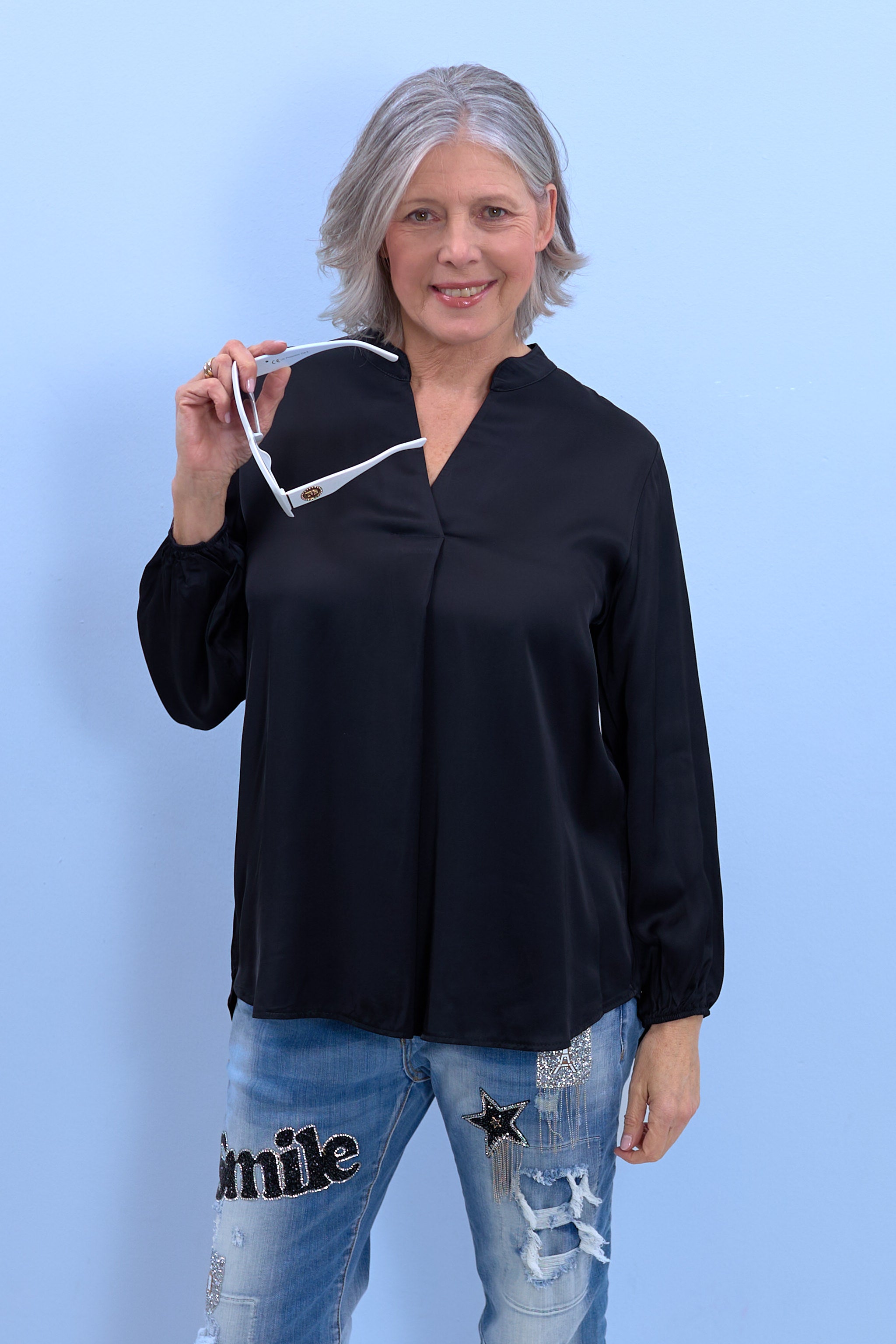 Blouse made of shiny fabric with a V-neck, black