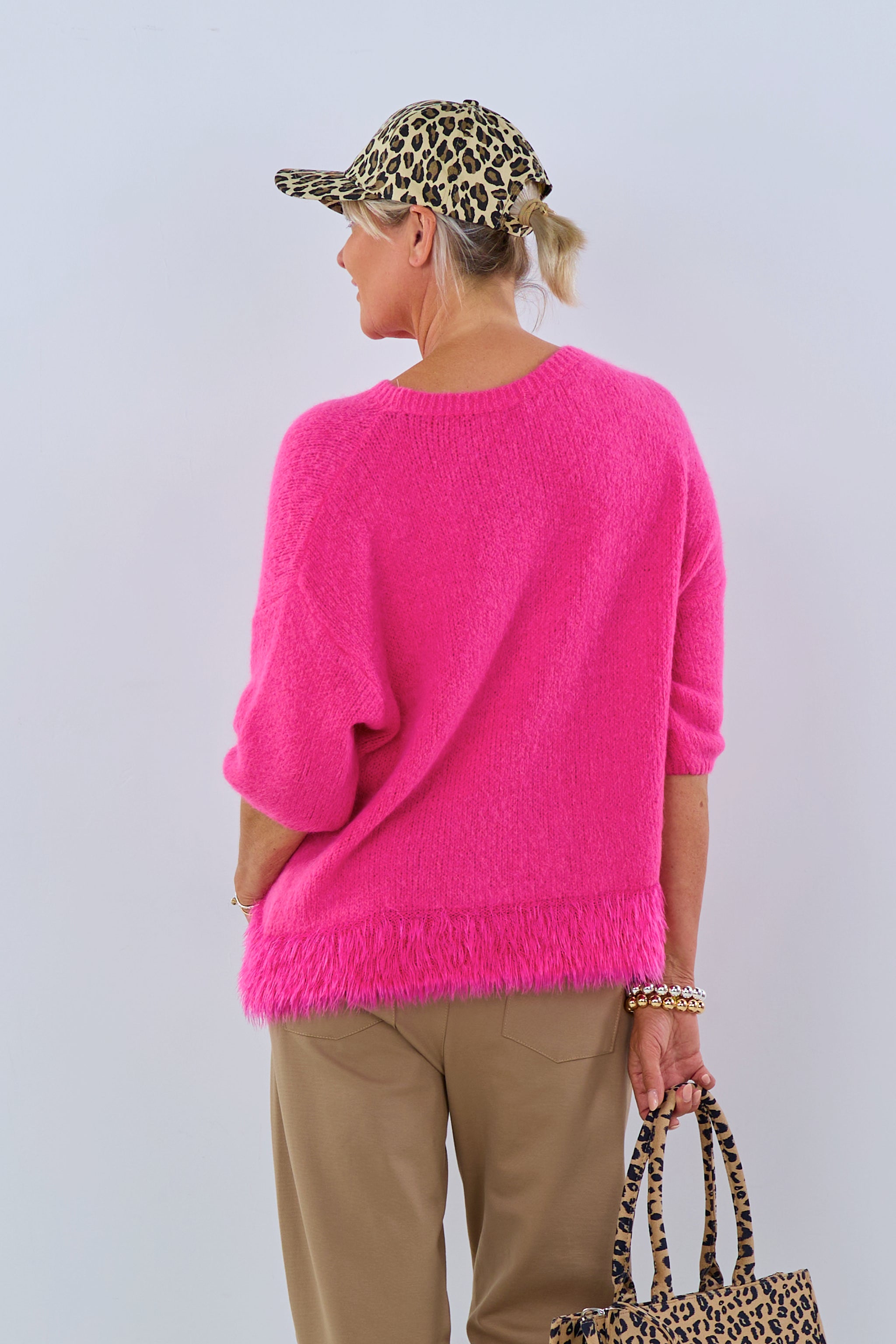 Kuscheliger kurzarm Strickpulli in pink mit Fransen von Trends & Lifestyle