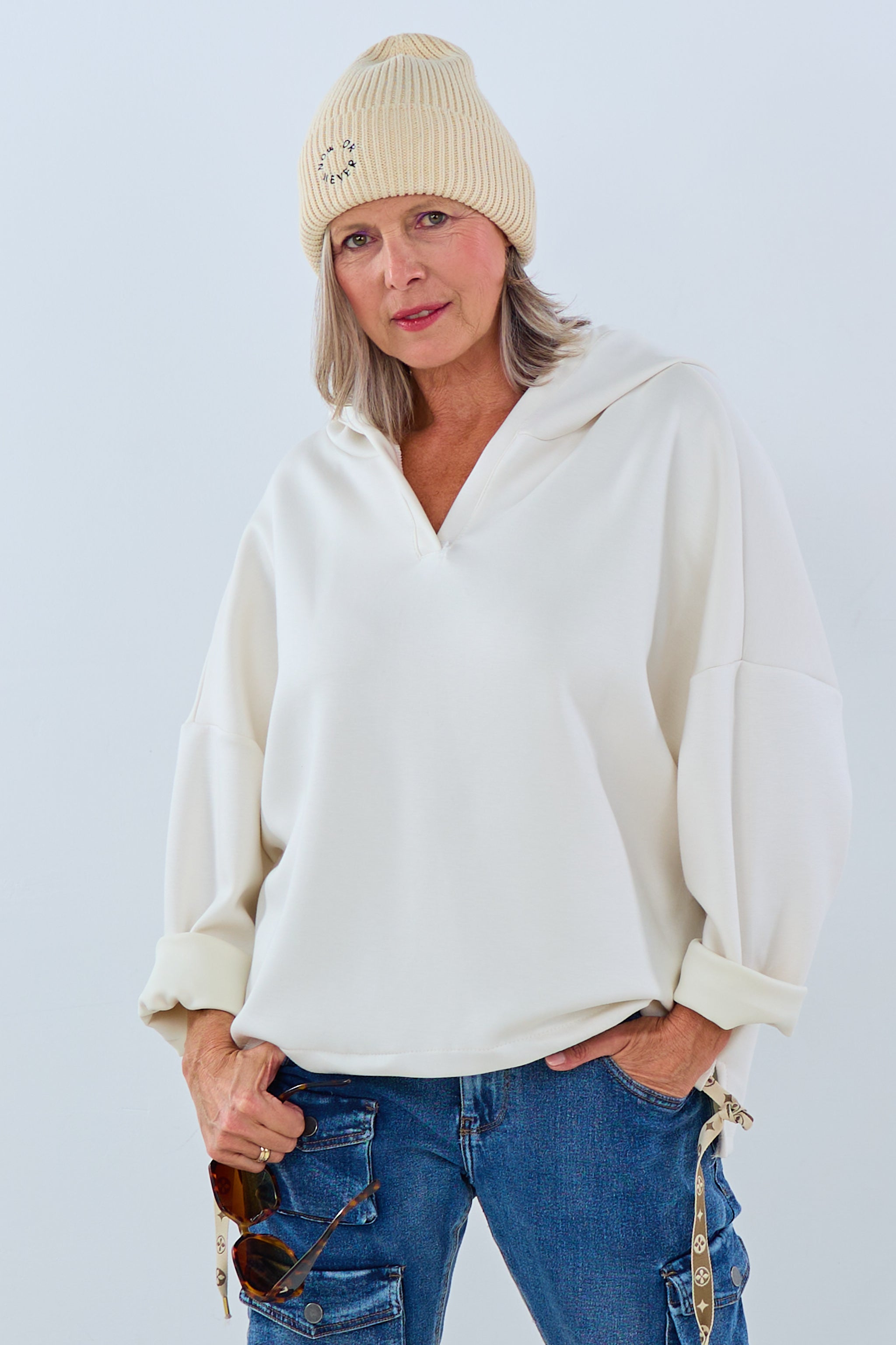 Soft hoodie with ruffles at the waistband, cream