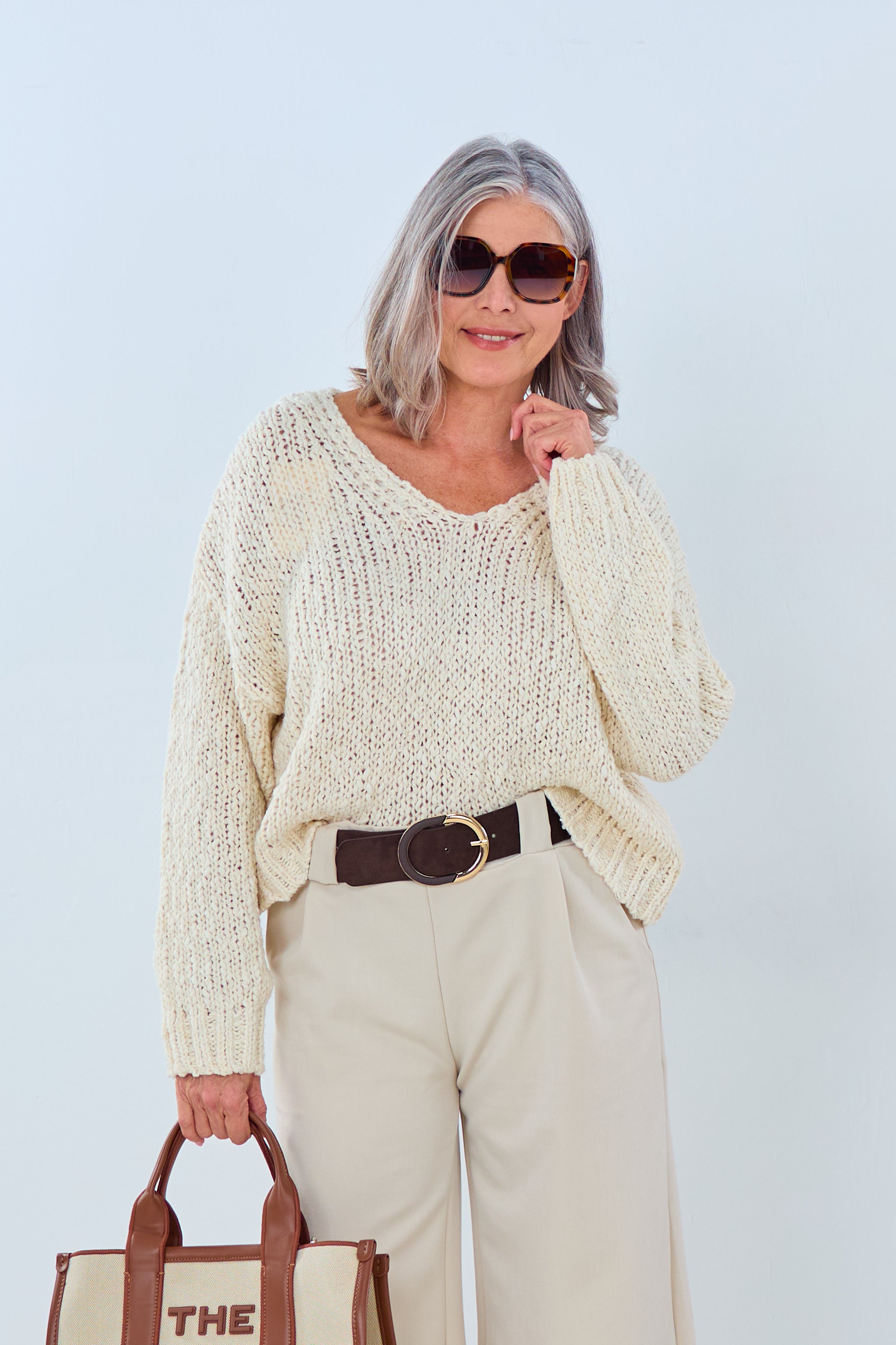 Süsser kurzer Strickpulli mit V-Ausschnitt, creme von Trends & Lifestyle