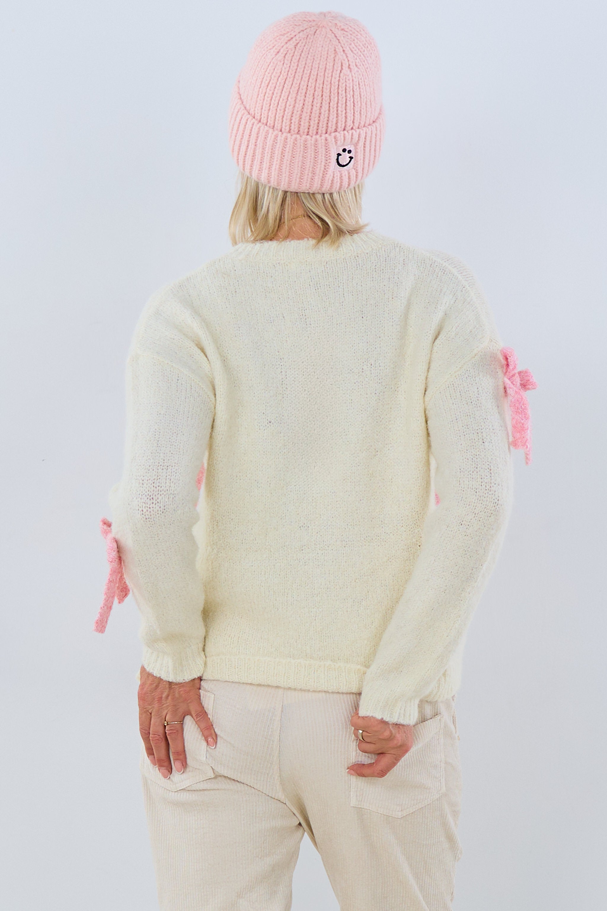 Strickpulli mit aufgenähten Schleifen, creme-rosa/beere von Trends & Lifestyle