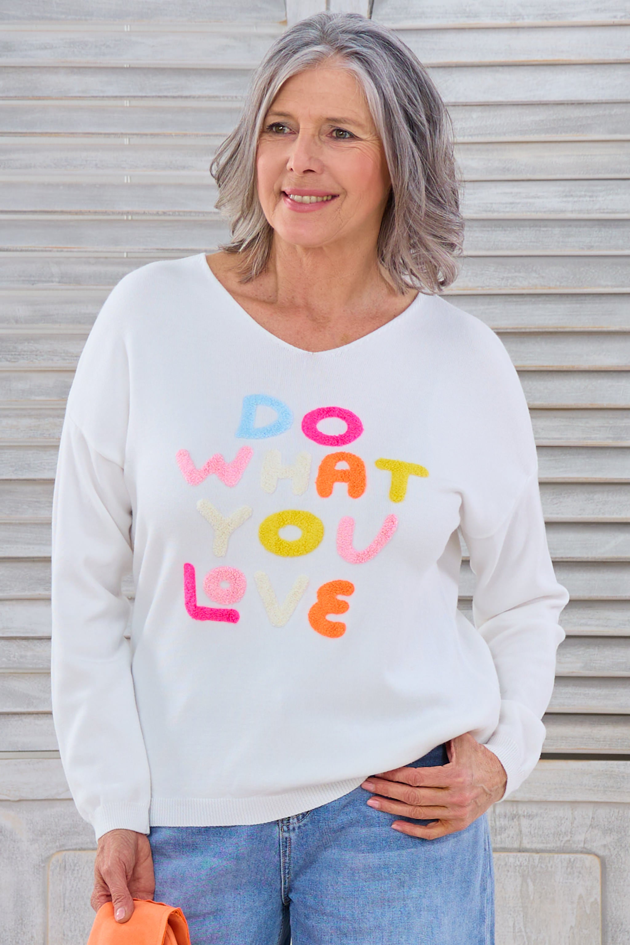 Leichter Strickpulli mit Do what you love-Flock, ecru-bunt von Trends & Lifestyle Deutschland GmbH