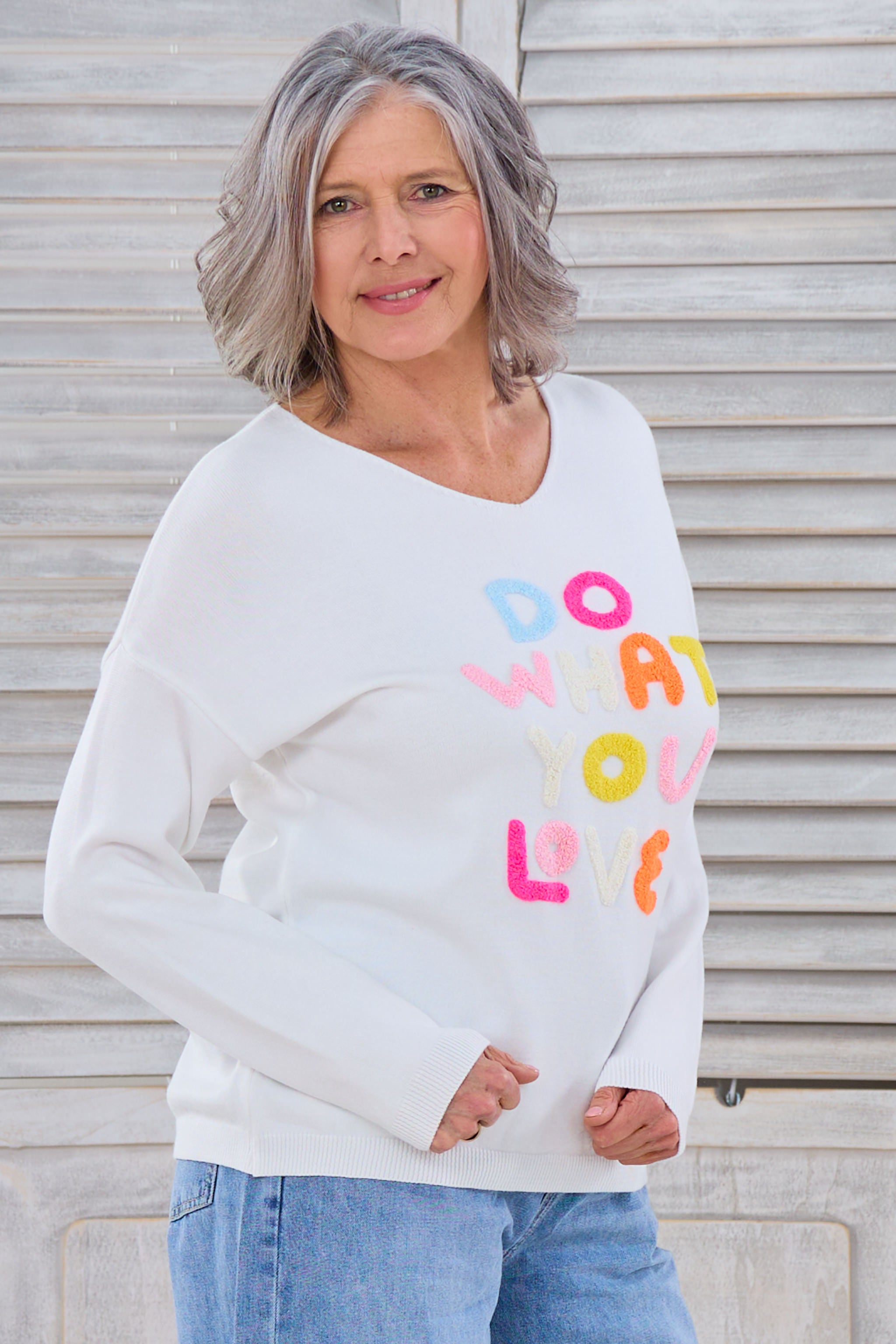 Leichter Strickpulli mit Do what you love-Flock, ecru-bunt von Trends & Lifestyle Deutschland GmbH