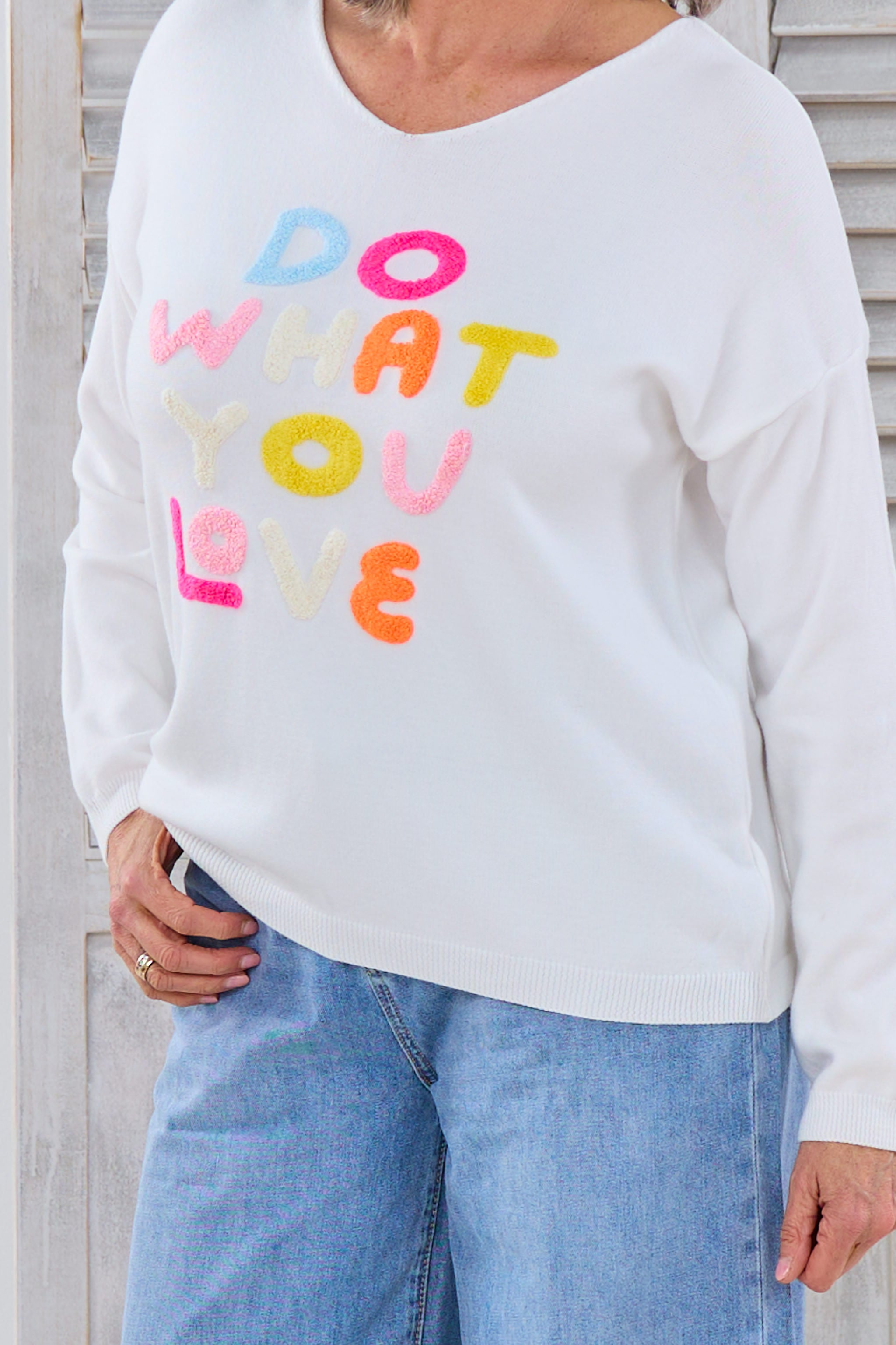 Leichter Strickpulli mit Do what you love-Flock, ecru-bunt von Trends & Lifestyle Deutschland GmbH