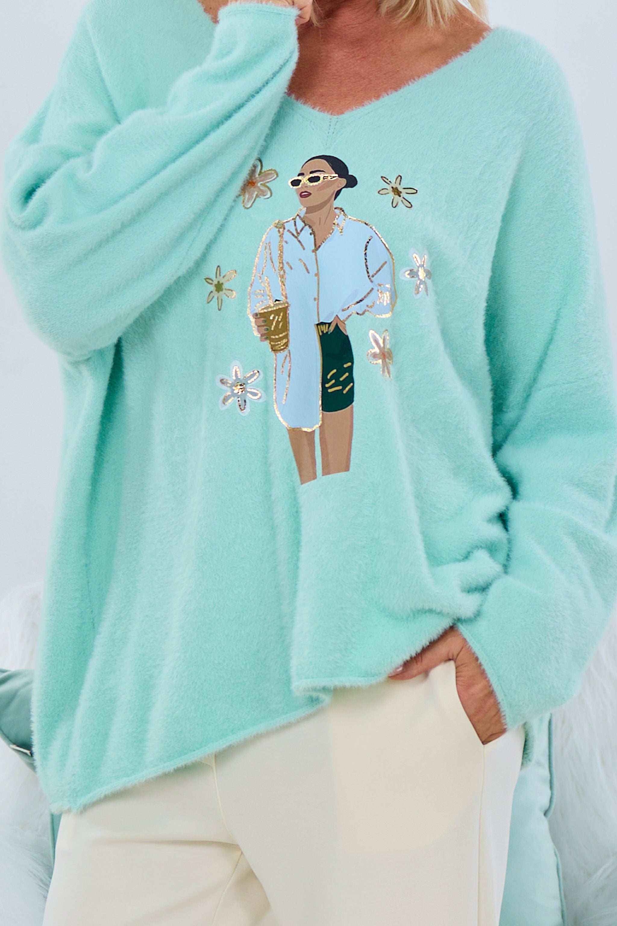 Kuscheliger Strickpulli mit Model-Motiv, mint von Trends & Lifestyle Deutschland GmbH