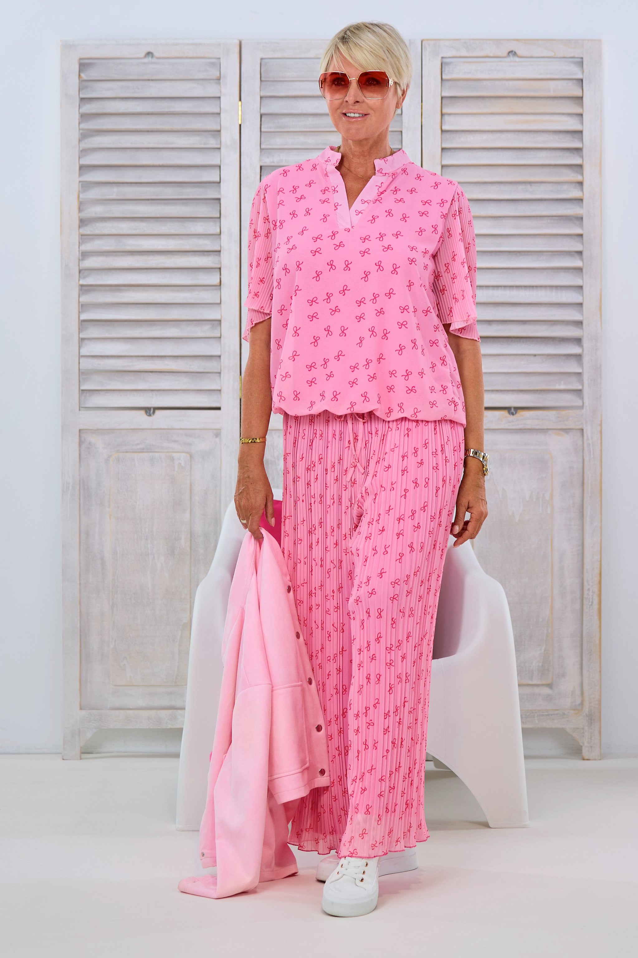 Bluse mit Schleifen und Plissee-Ärmeln, rosa-rot von Trends & Lifestyle Deutschland GmbH