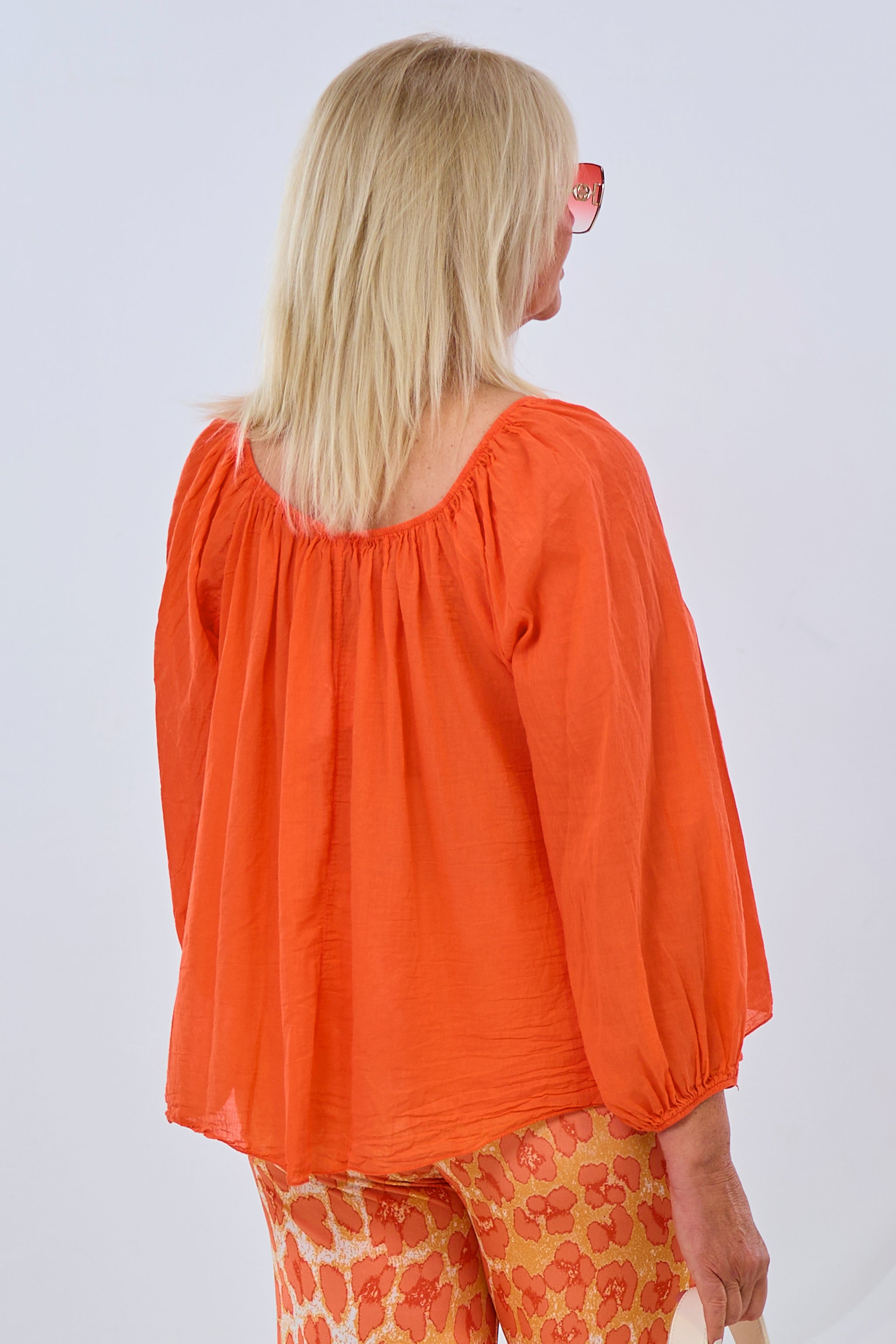 airy blouse with off-the-shoulder neckline, orange