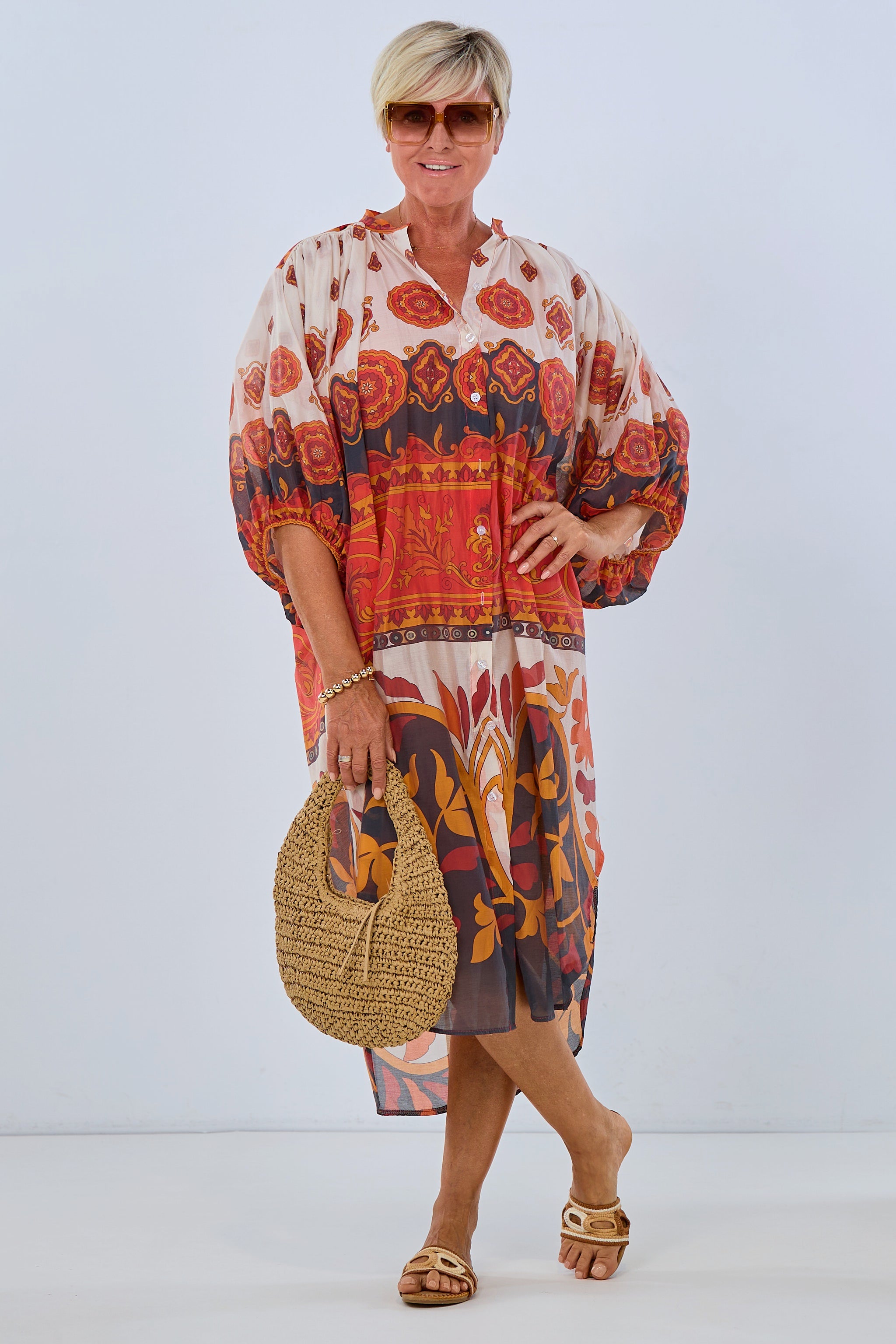 colorful caftan dress, red-orange-cream