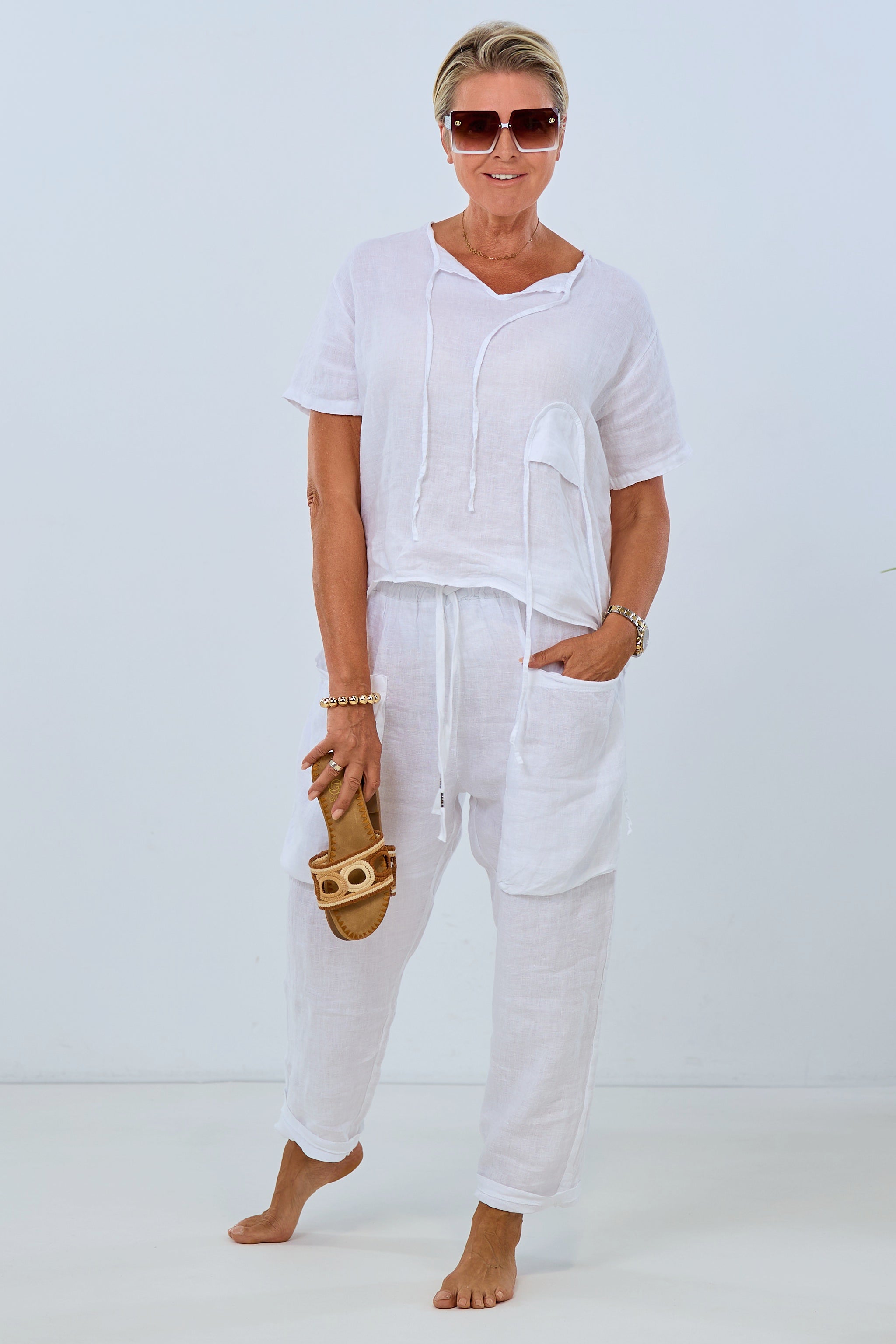 Wide linen pants with large pockets, white