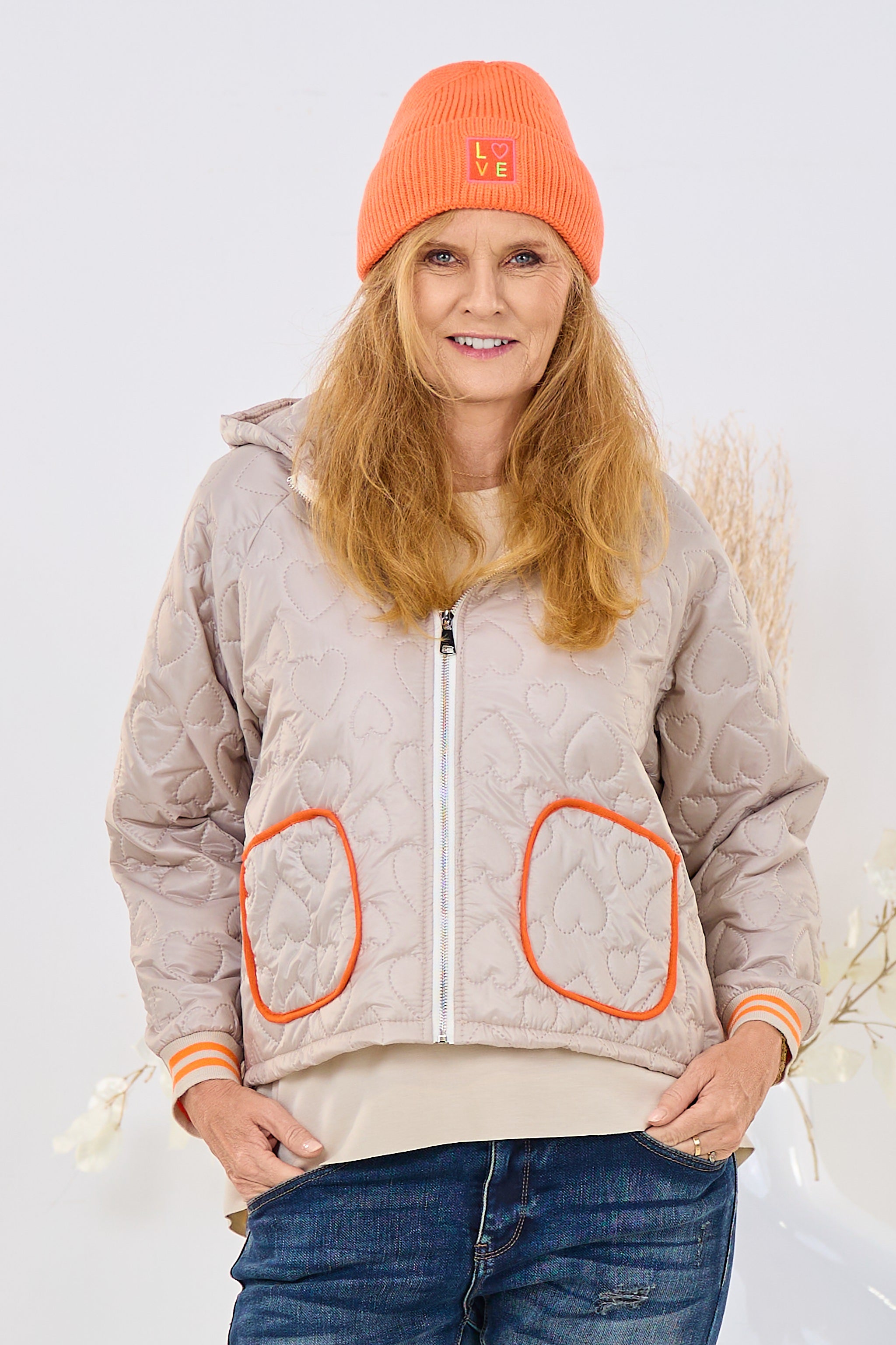 Steppjacke mit Kapuze und aufgesetzten Taschen, beige-orange
