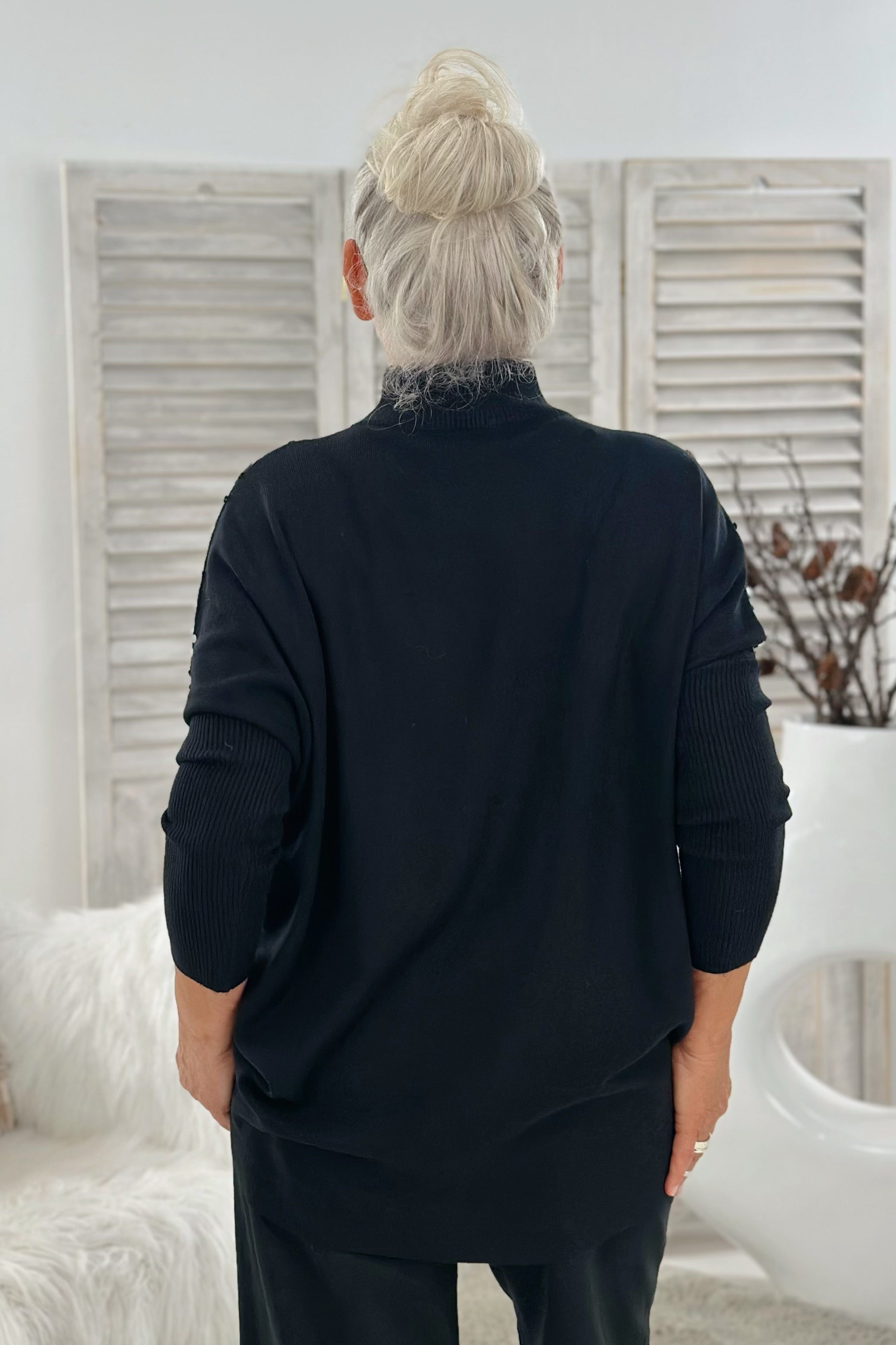 Strickpulli mit Pailletten und Turtleneck, schwarz-silber