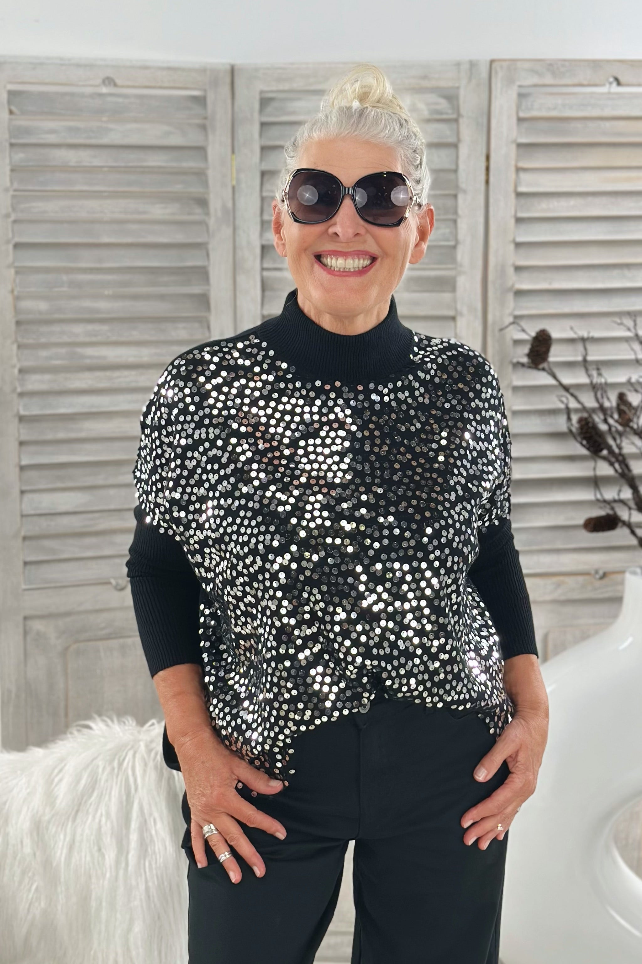 Strickpulli mit Pailletten und Turtleneck, schwarz-silber