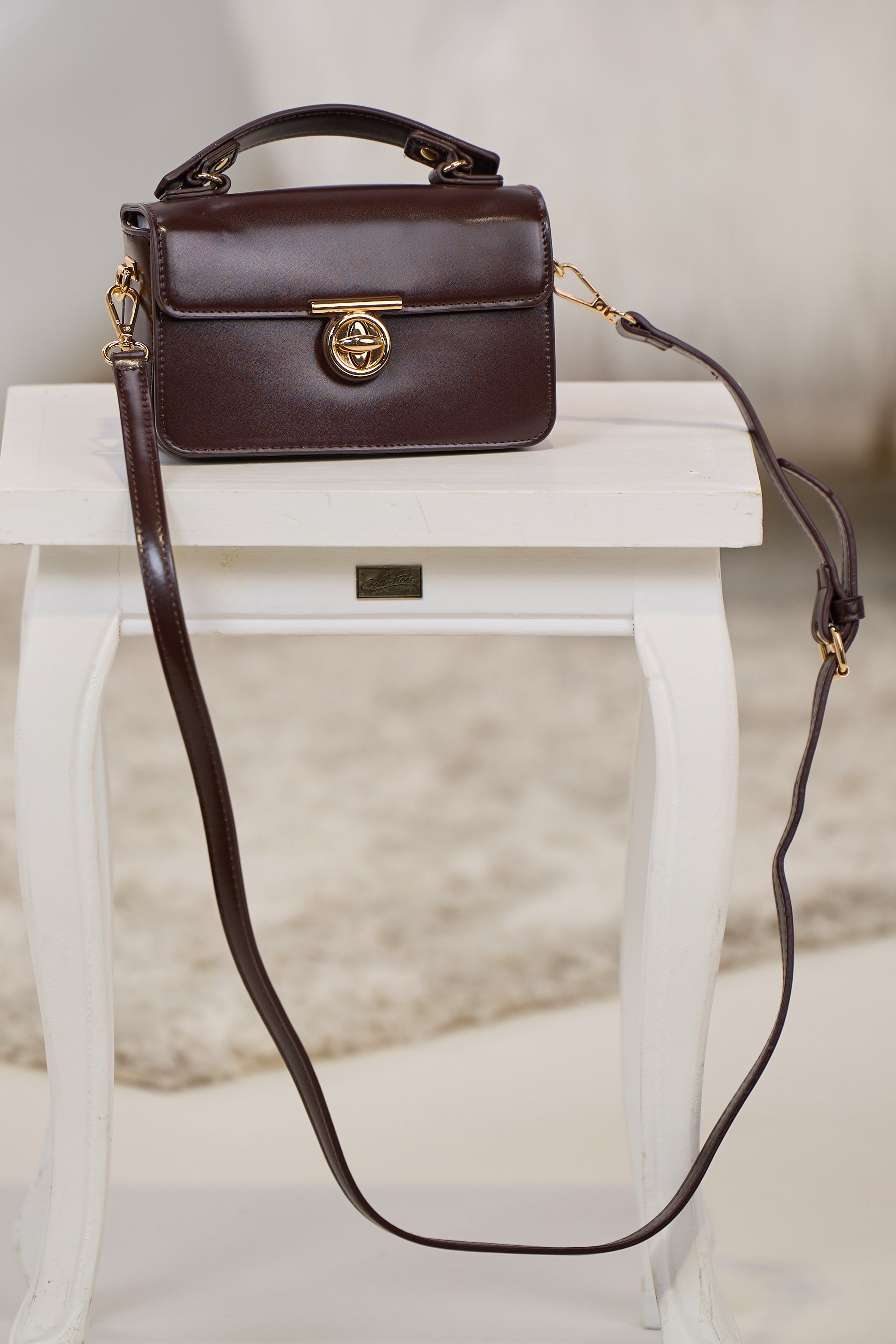 elegante Tasche mit Drehverschluss, dunkelbraun-gold