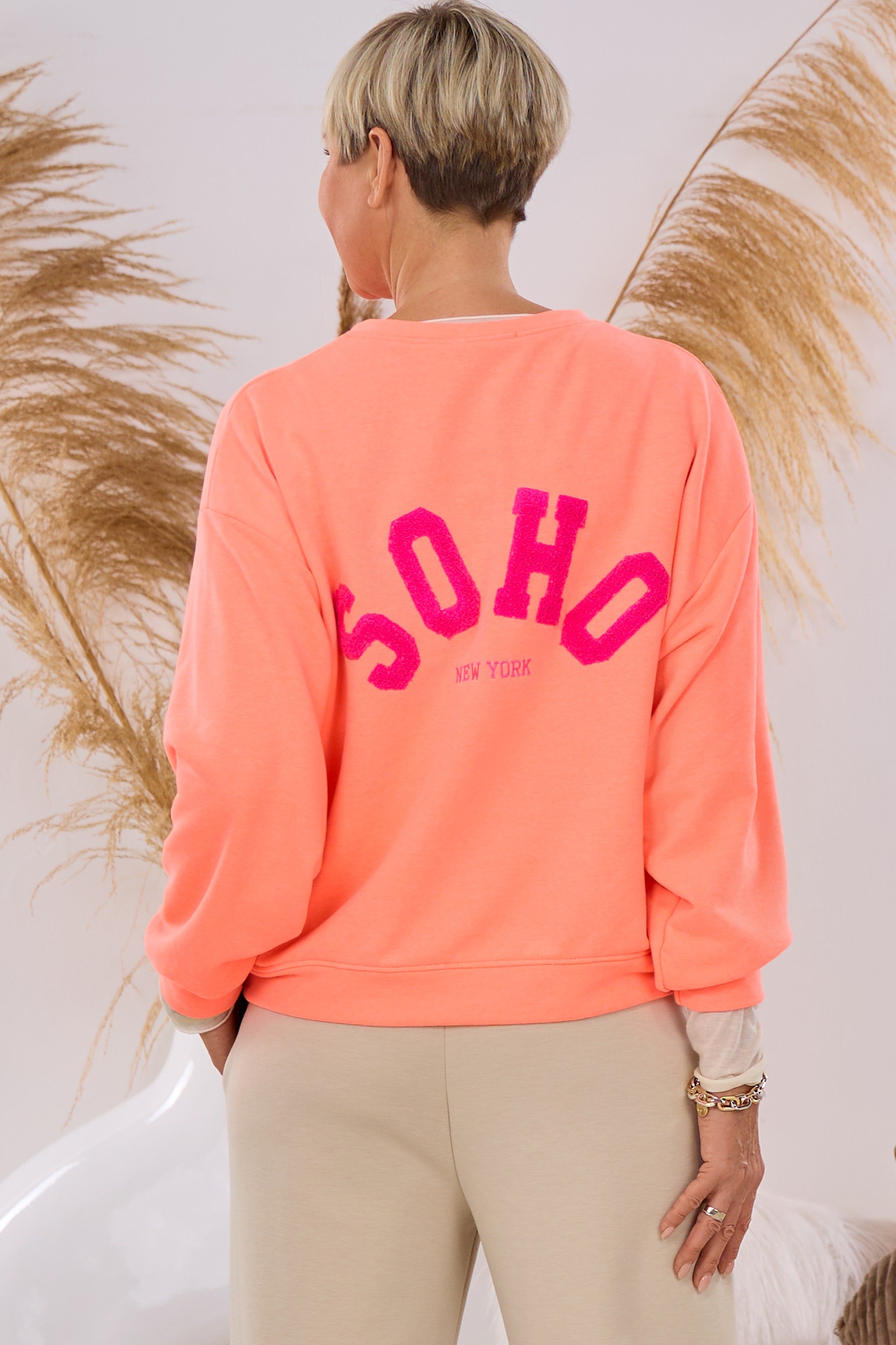 Sweaty SOHO New York, neon apricot