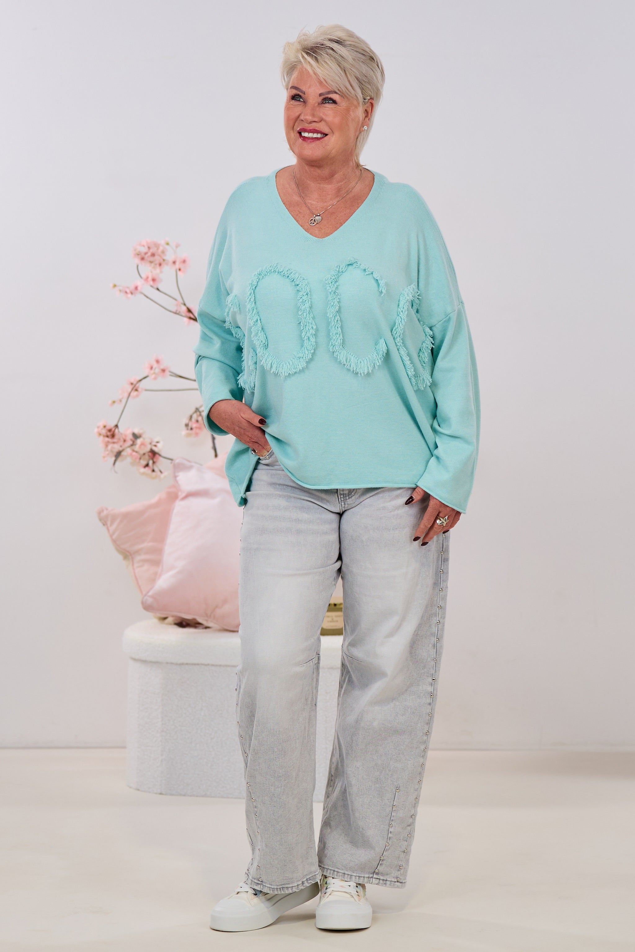 Oversized Strickpulli mit fransigen Buchstaben, mint