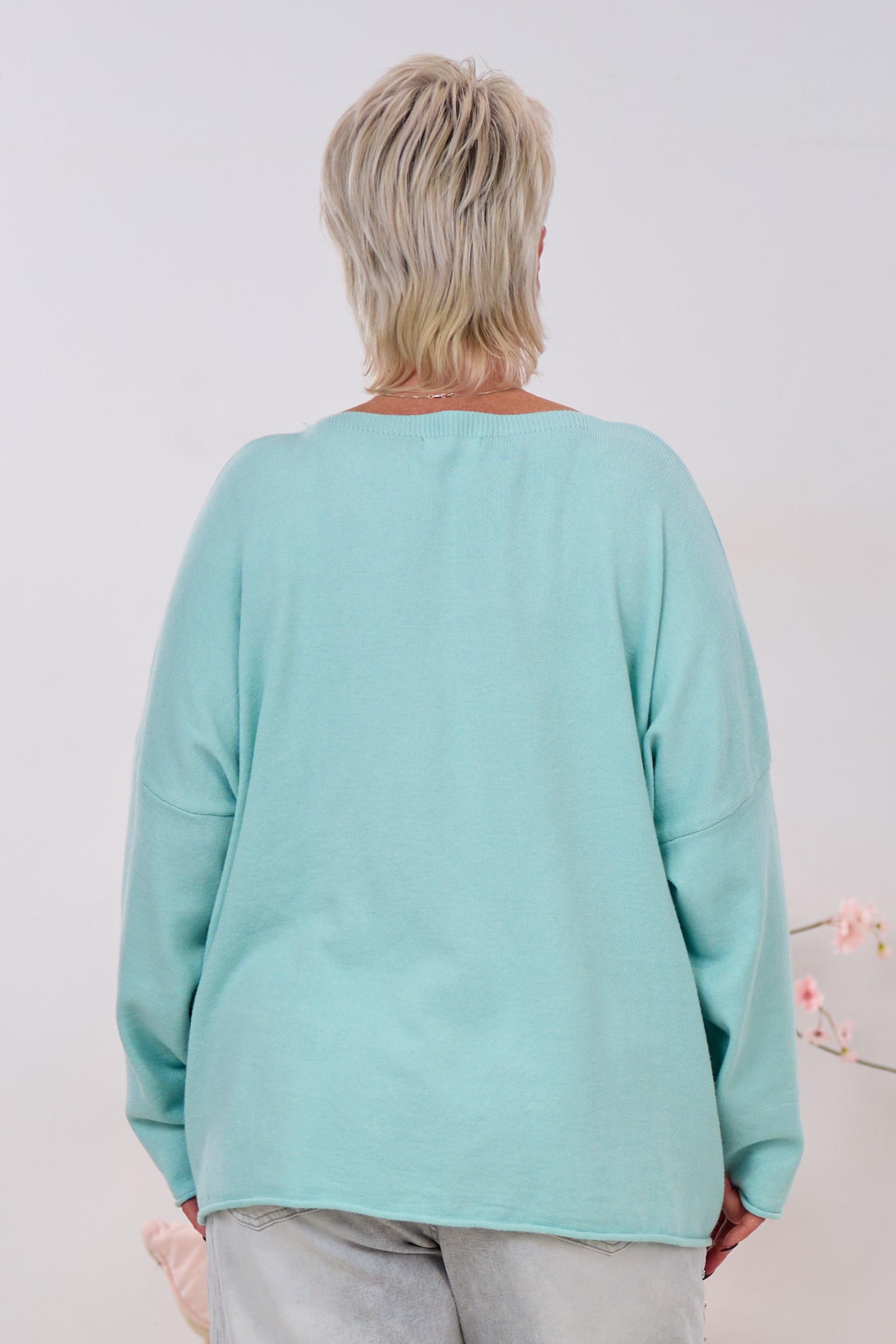 Oversized Strickpulli mit fransigen Buchstaben, mint