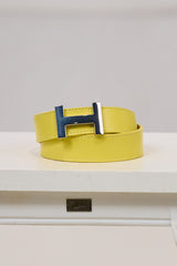 Leather belt with silver buckle, yellow