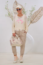 Strickpulli mit INFINITY-Flock, creme