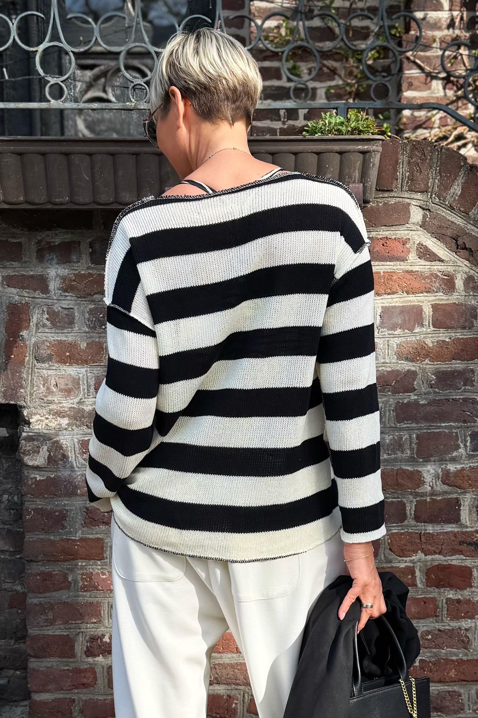 Strickpulli mit breiten Streifen, schwarz-creme