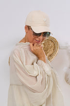 Kappe mit Perlen-Herz, beige