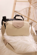 Kleine zylindrische Umhängetasche, beige