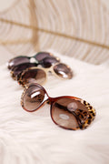 Elegante Sonnenbrille mit Leo, braun